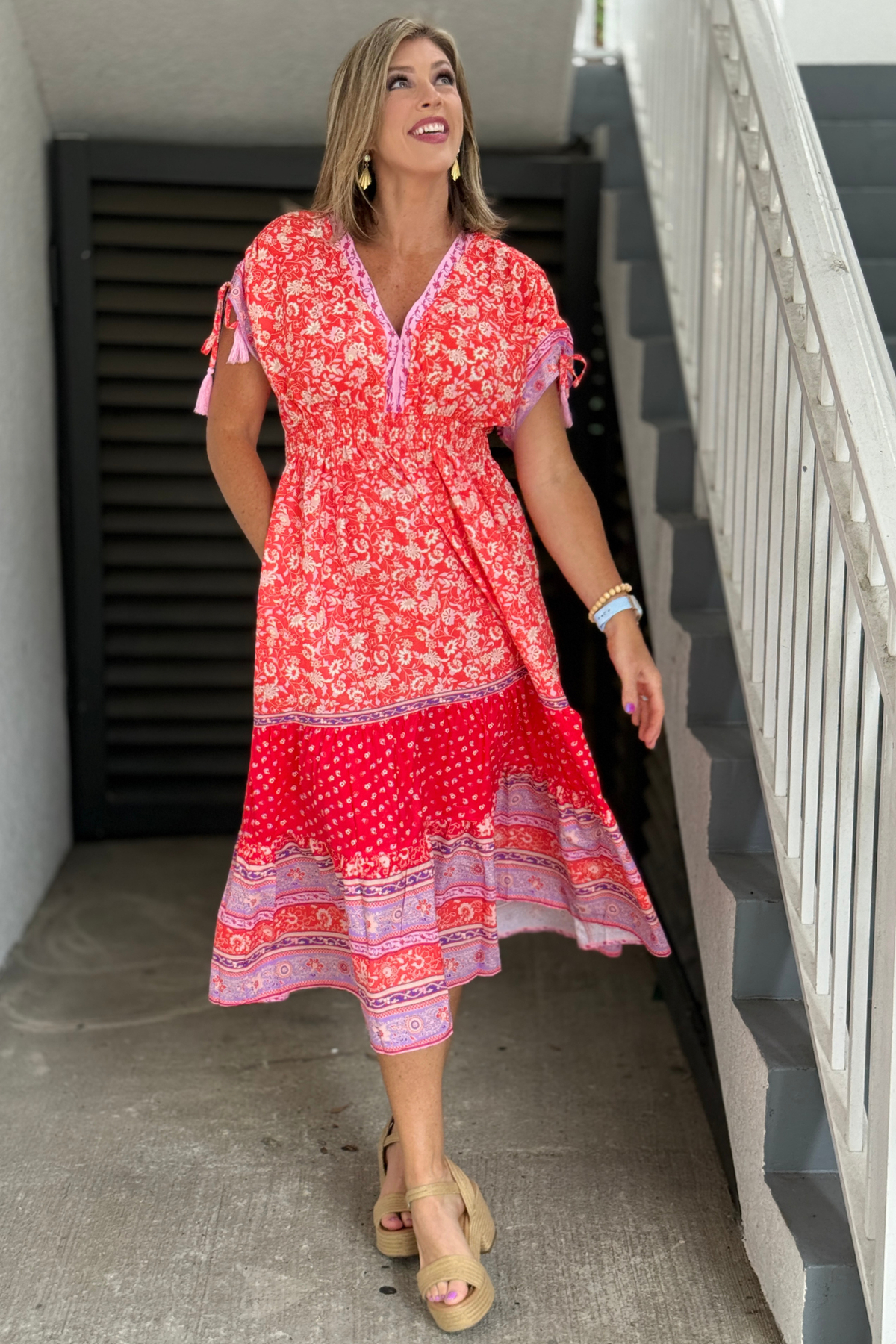 The Hibiscus Breeze Dress featuring vibrant floral and border prints