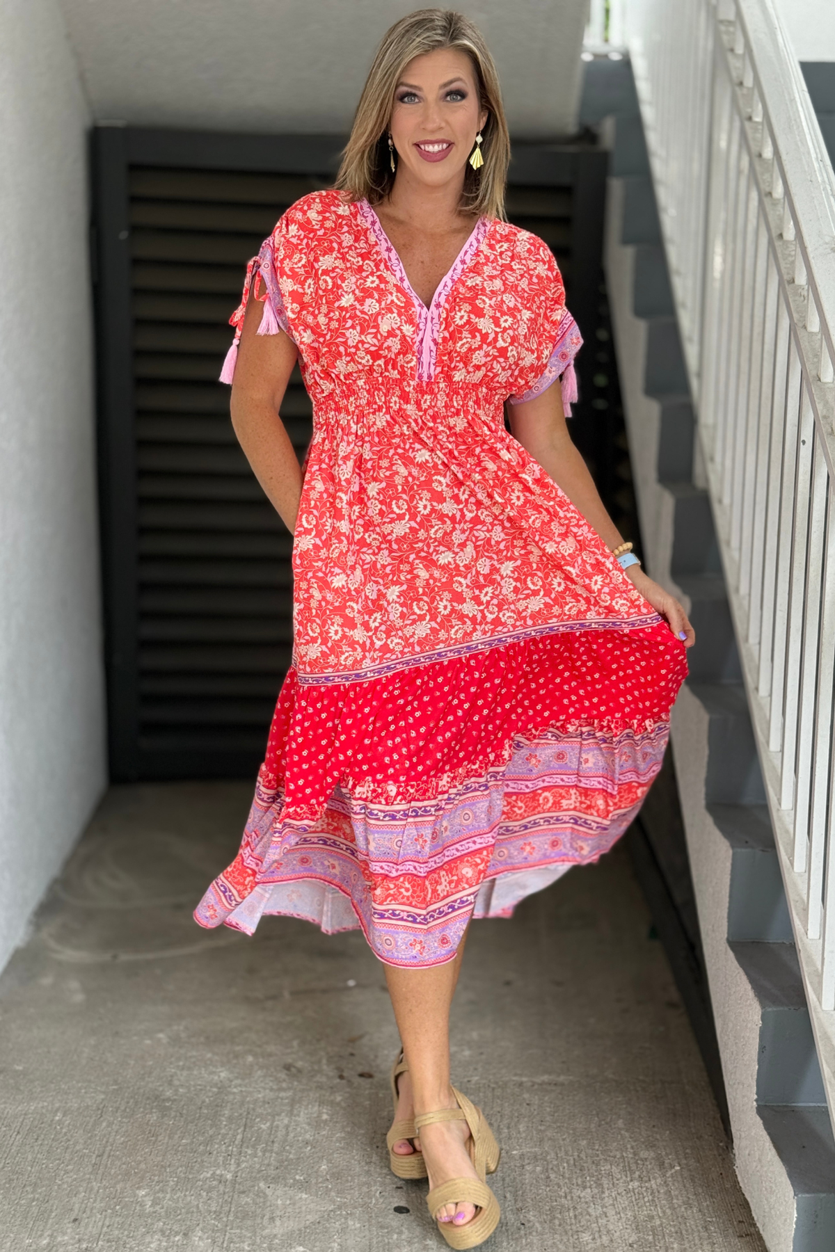 Women's flowy floral midi dress in coral and lavender tones