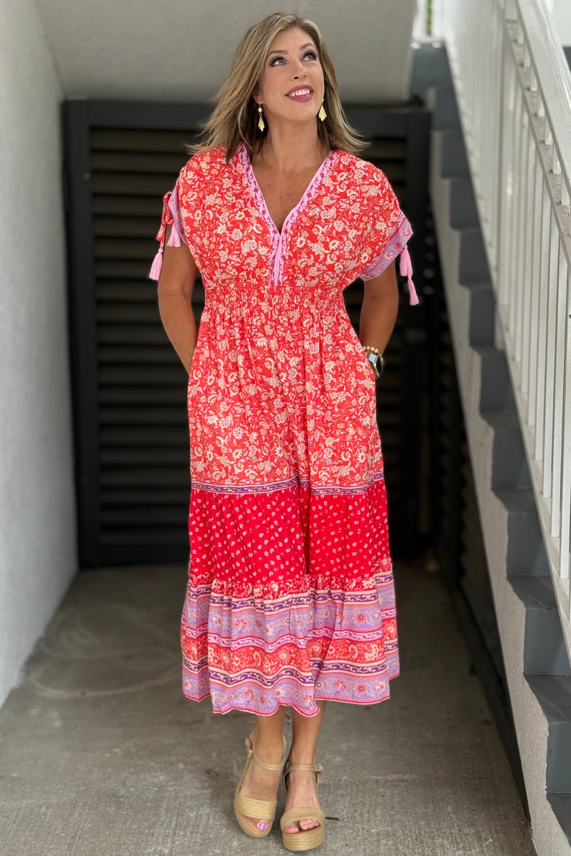 Coral floral midi dress with tassel tie sleeves and empire waist