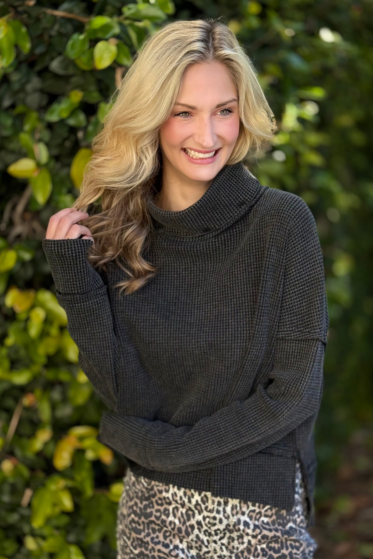 Black waffle knit cowl neck pullover front view