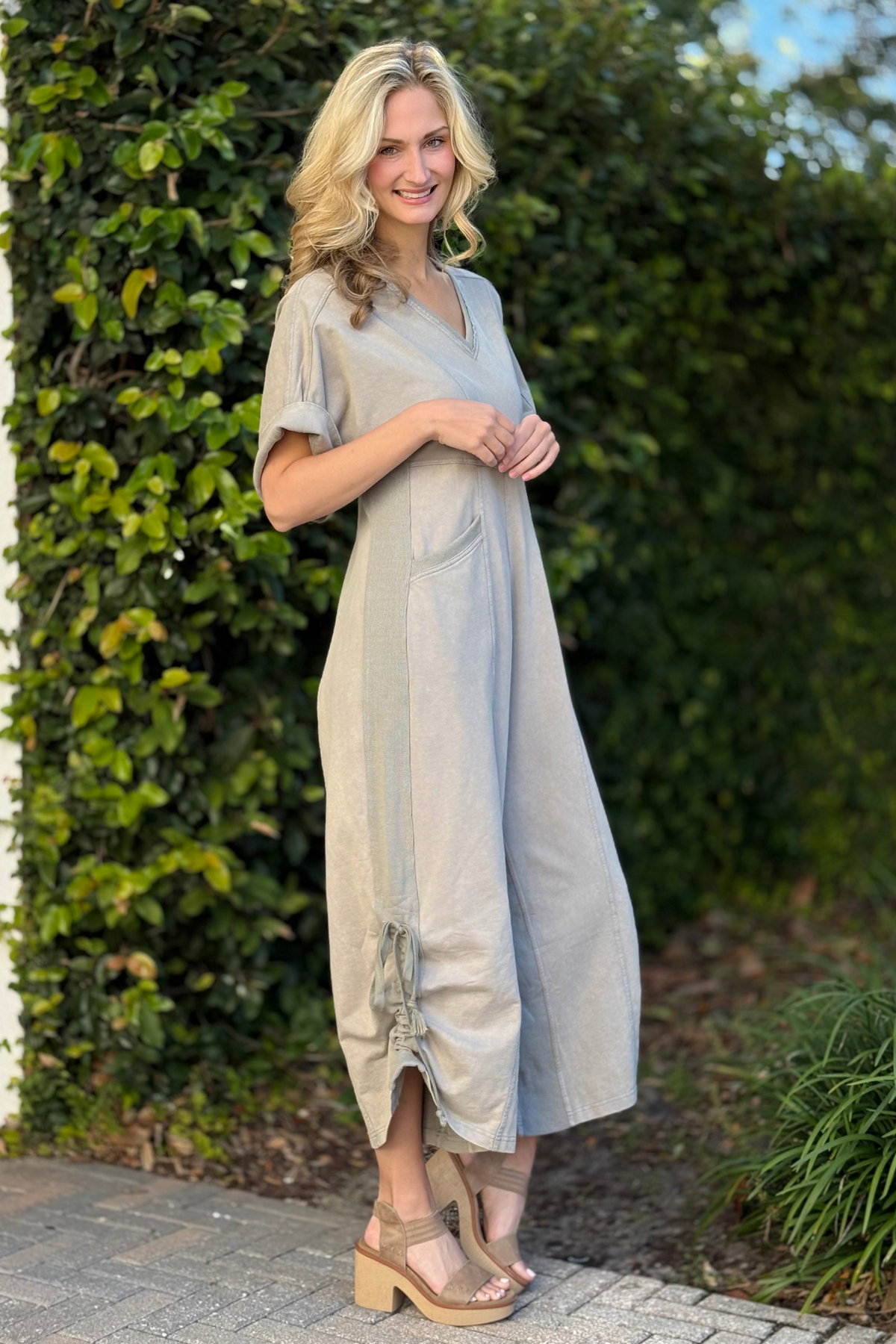 Relaxed fit olive jumpsuit styled for everyday wear