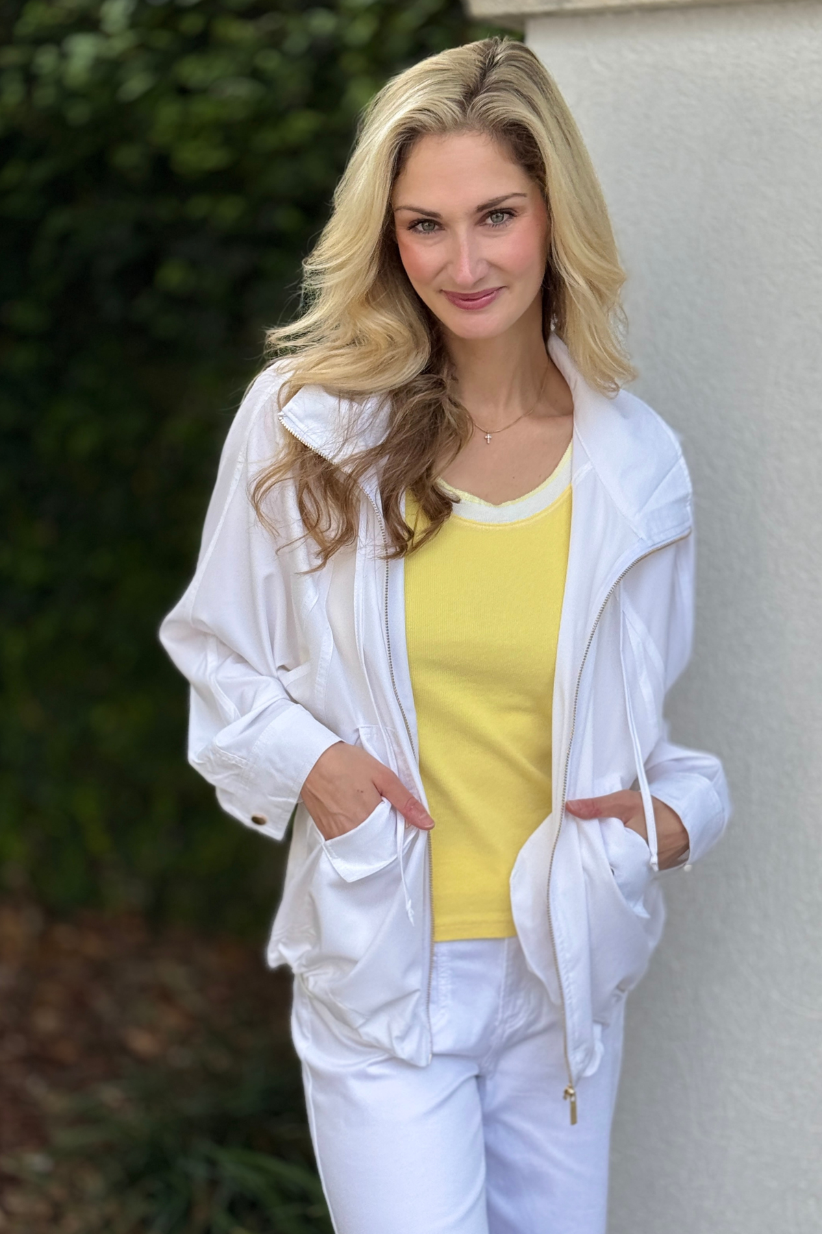 Back view of white Dear Scarlett hooded jacket