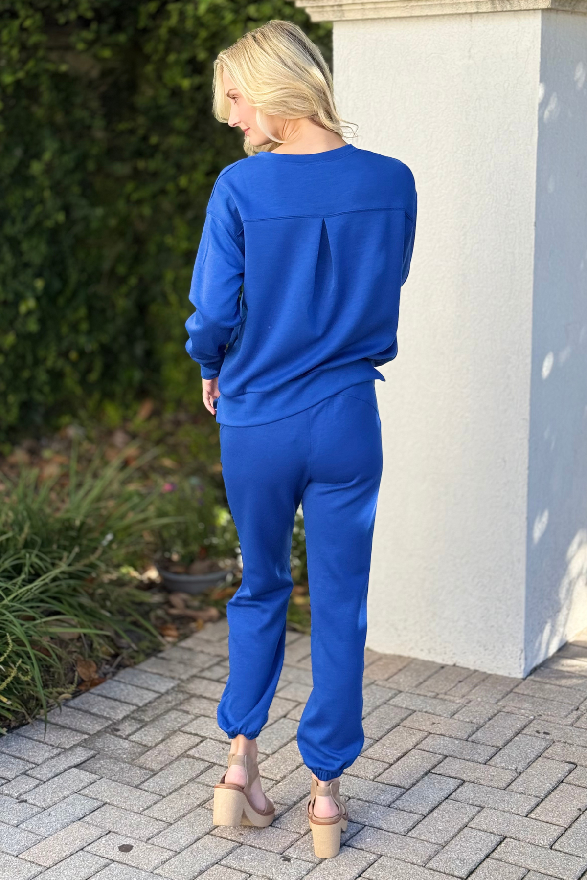 Wrinkle-free royal blue pullover and jogger set with pleated back