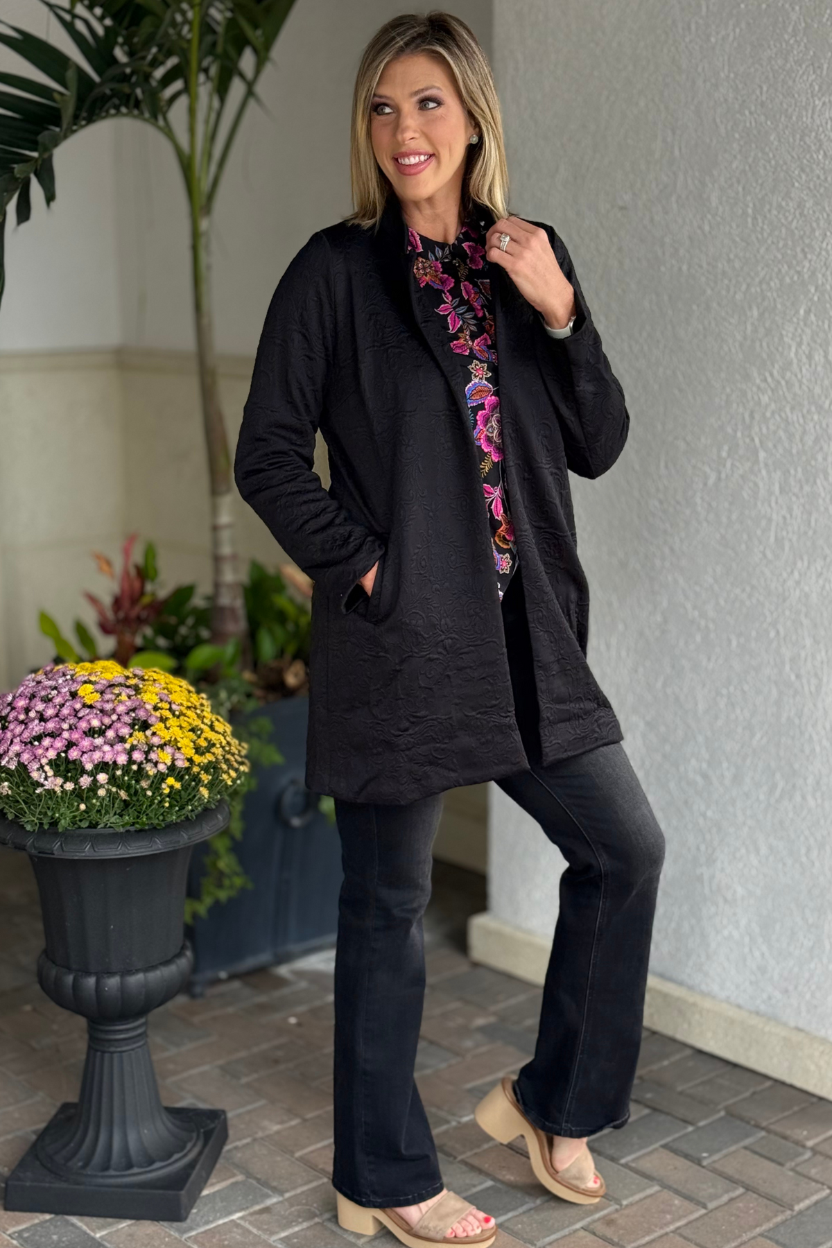 Obsidian Muse black jacquard midi coat with structured silhouette and side pockets