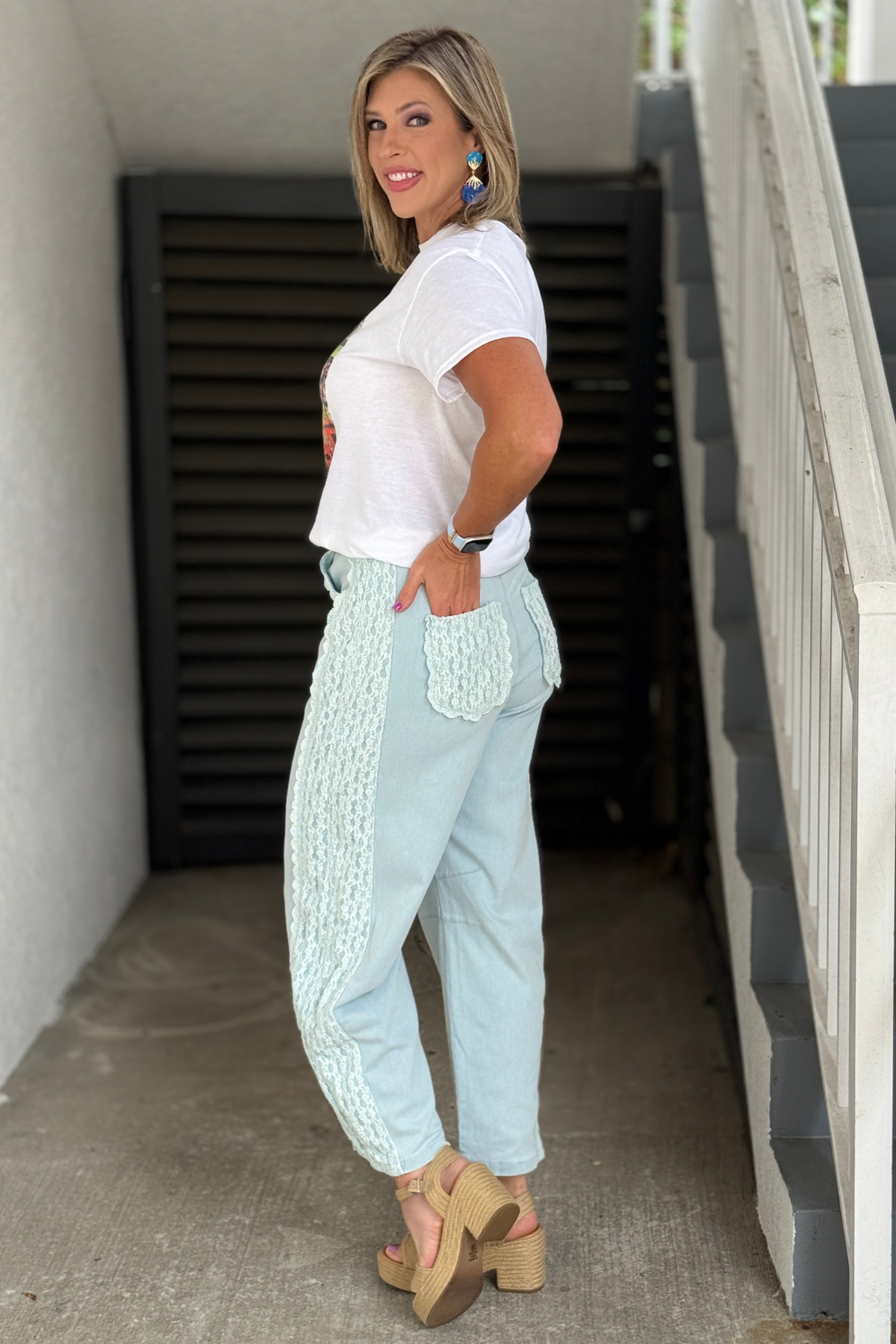 Back view of lace pocket detail jeans