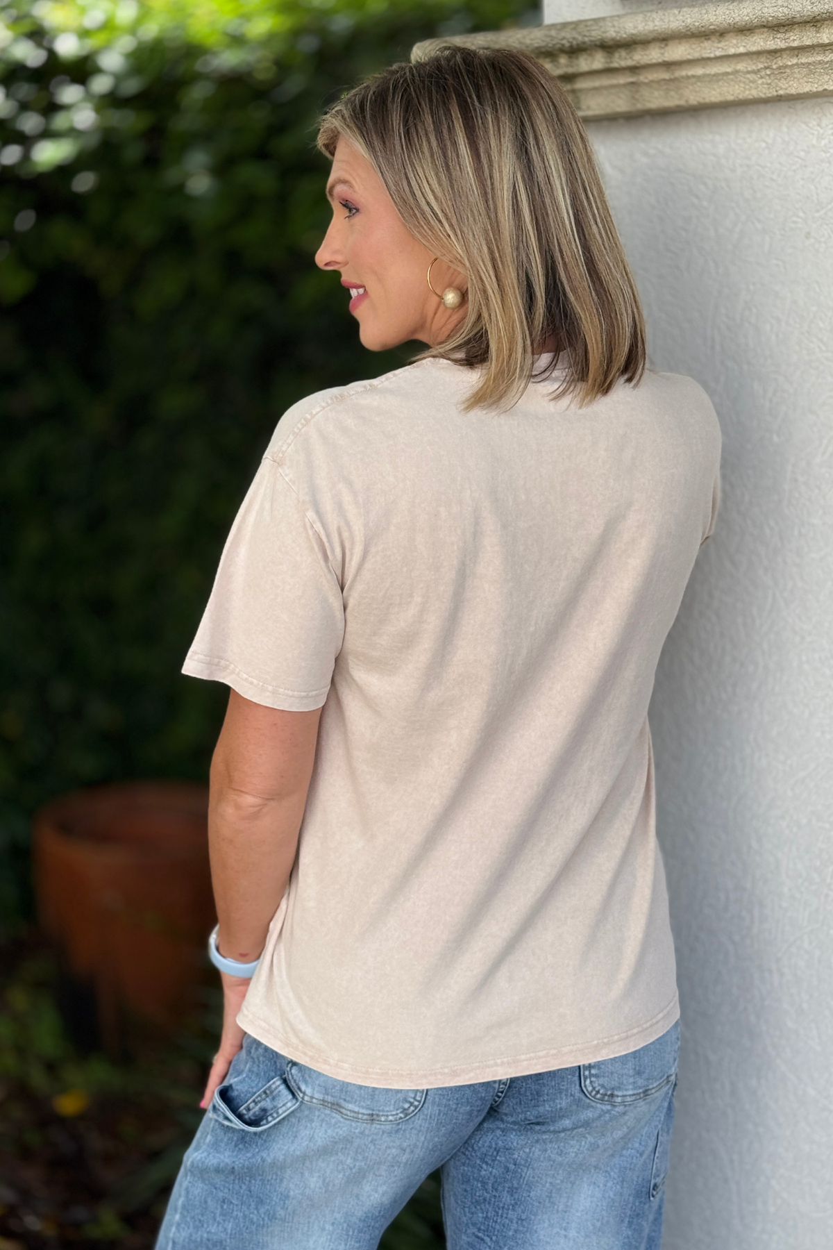 Everyday boutique graphic tee styled with leopard belt