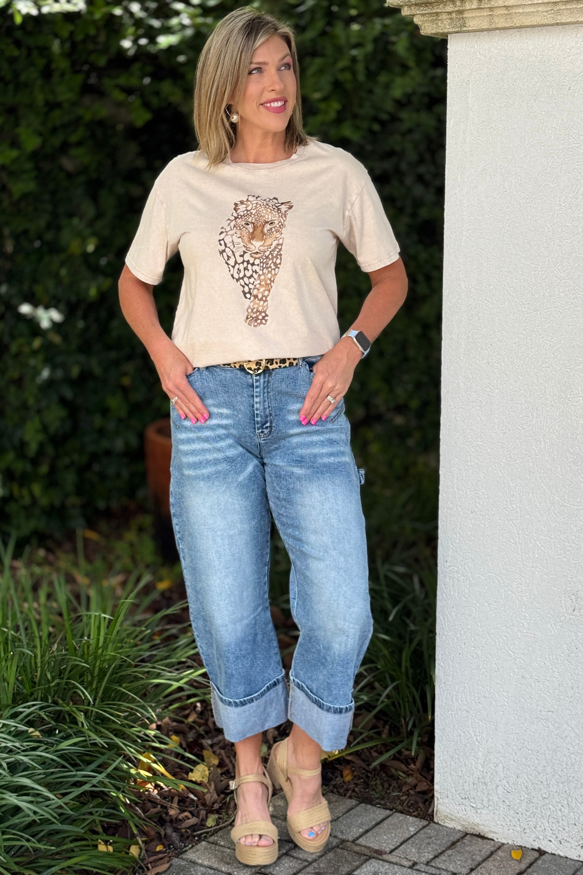 Women’s cropped cuffed denim styled with graphic tee