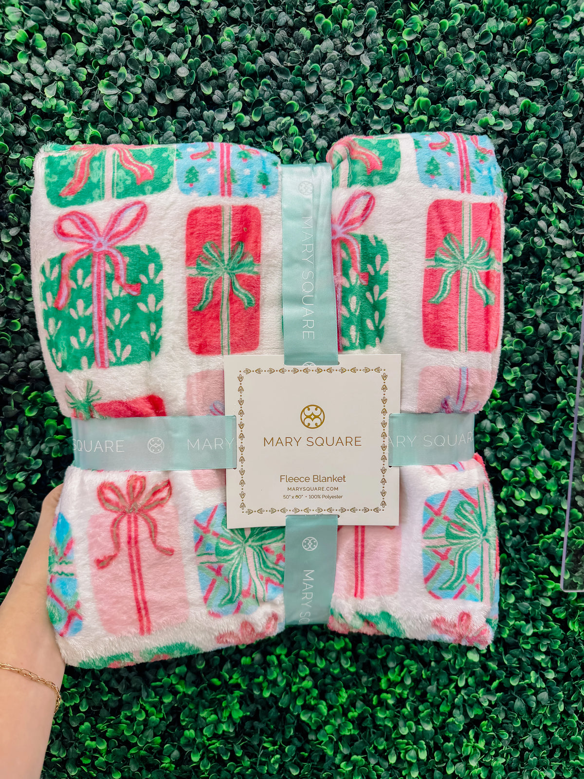 Mary Square Wrapped in Cheer Christmas fleece blanket
Christmas blanket with colorful wrapped presents and bows
Mary Square holiday throw blanket in Wrapped in Cheer print
Festive 50 x 60 fleece blanket with Christmas gift design
Colorful Christmas throw blanket by Mary Square
