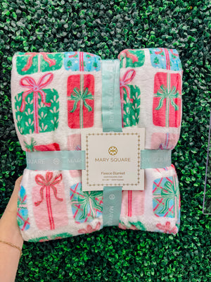 Mary Square Wrapped in Cheer Christmas fleece blanket
Christmas blanket with colorful wrapped presents and bows
Mary Square holiday throw blanket in Wrapped in Cheer print
Festive 50 x 60 fleece blanket with Christmas gift design
Colorful Christmas throw blanket by Mary Square