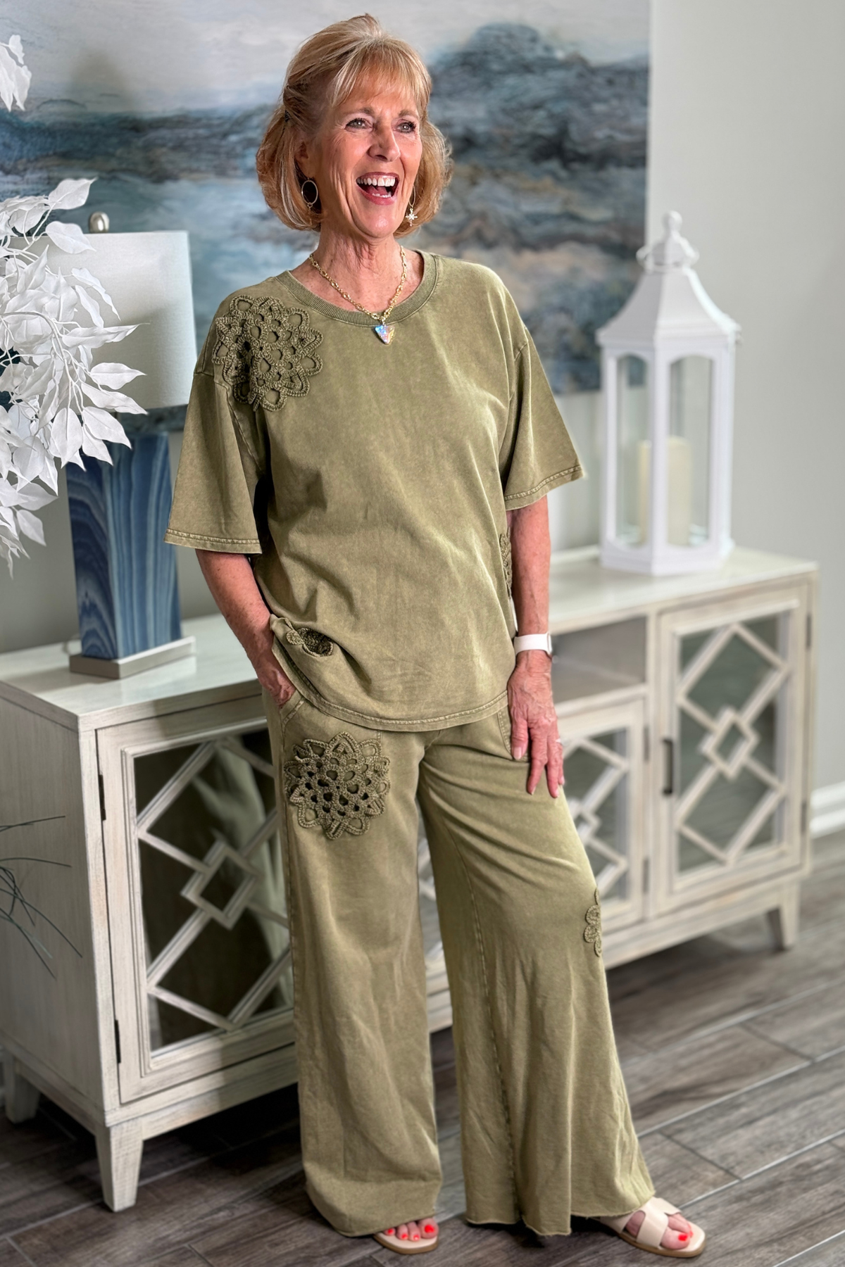Oversized faded olive T-shirt with tonal crochet floral appliqué details