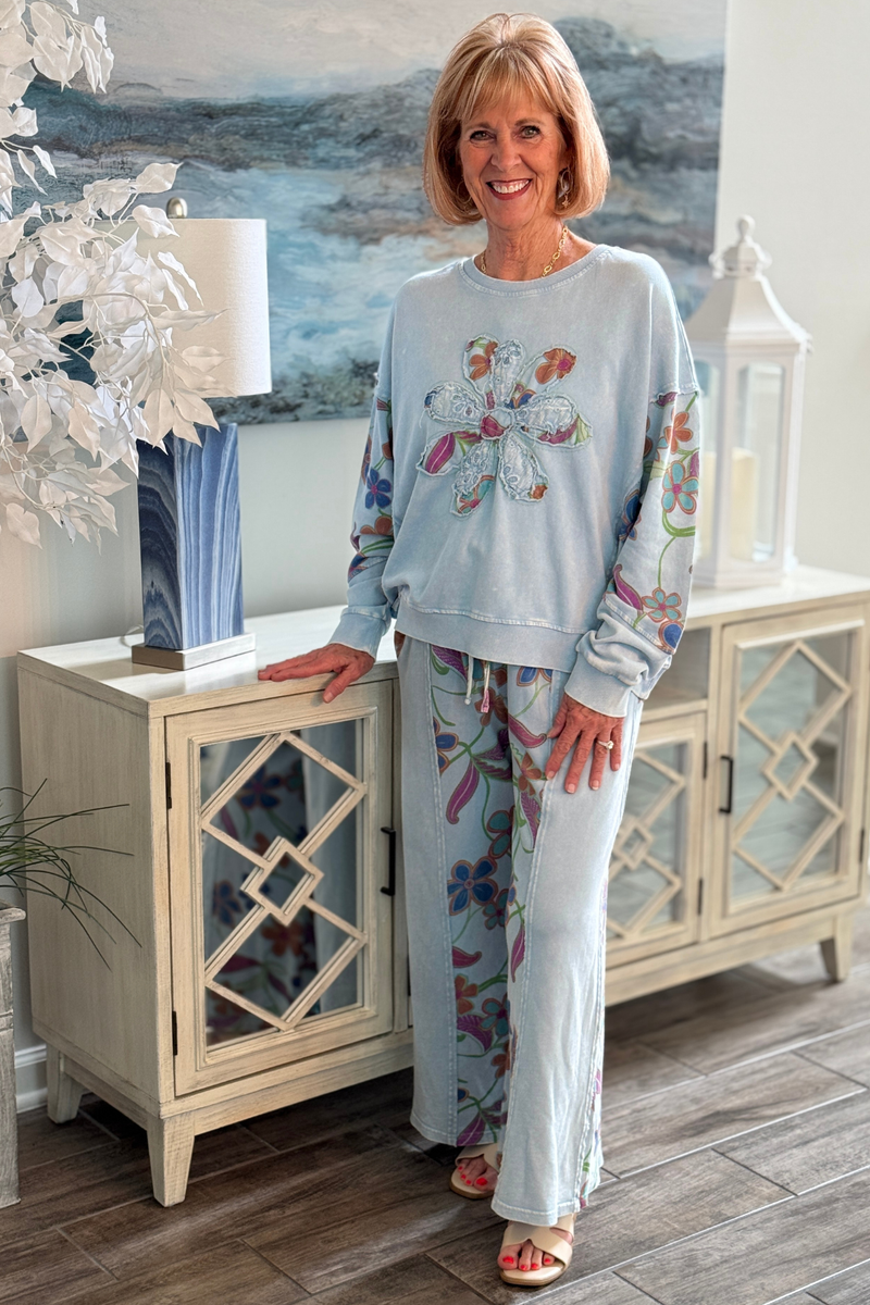 Peri blue sweatshirt with floral appliqué and printed sleeves