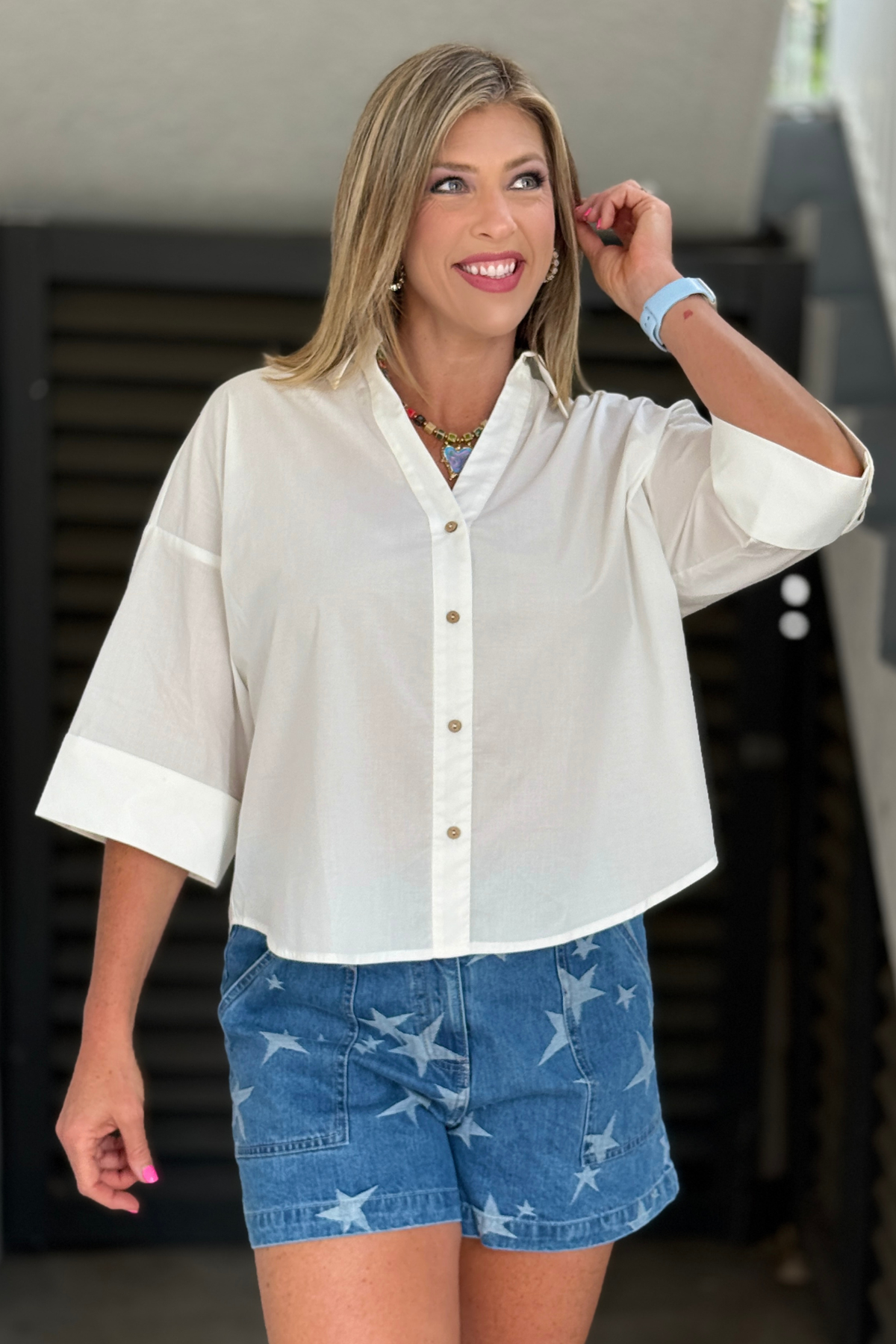 Women’s collared V-neck boutique blouse with cuff sleeves