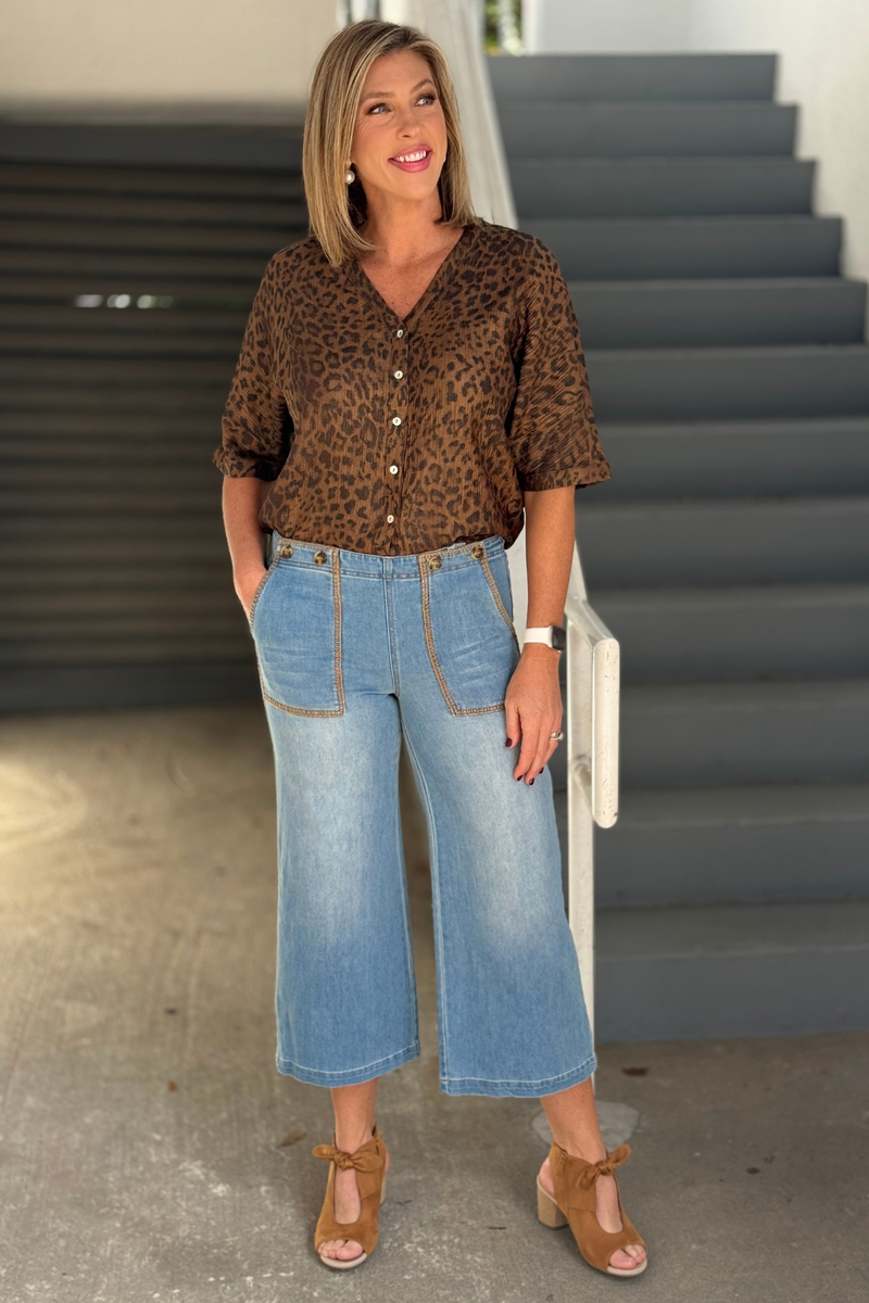 Women’s light wash cropped denim with oversized front patch pockets