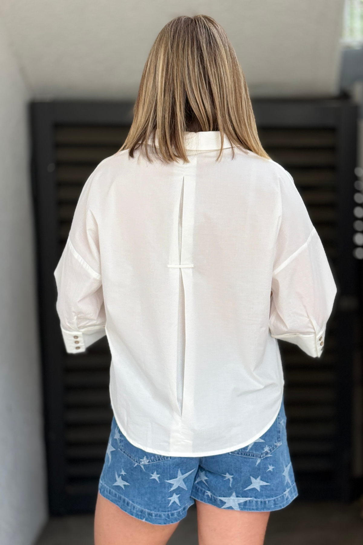 Lightweight off white summer blouse with back pleat detail