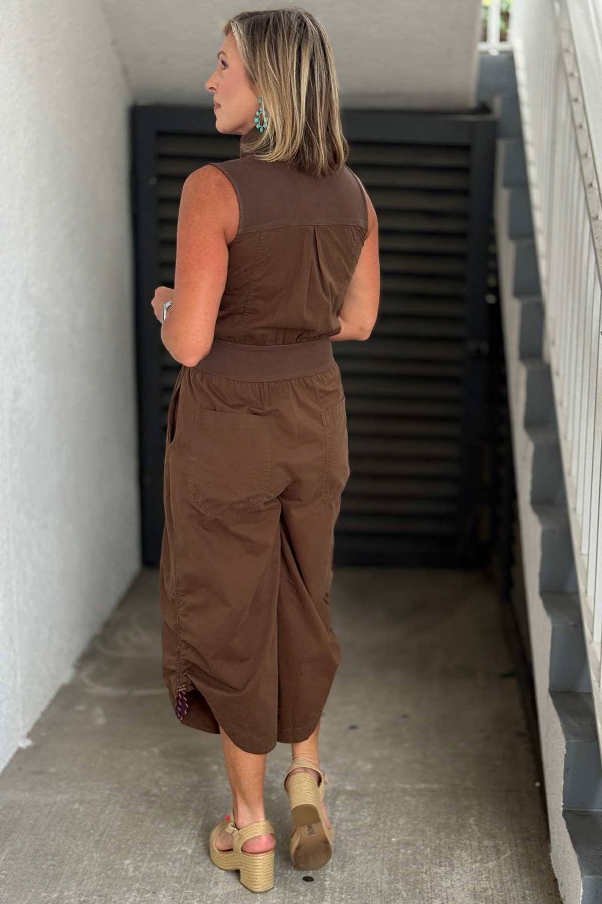 Boutique brown jumpsuit with pockets.
