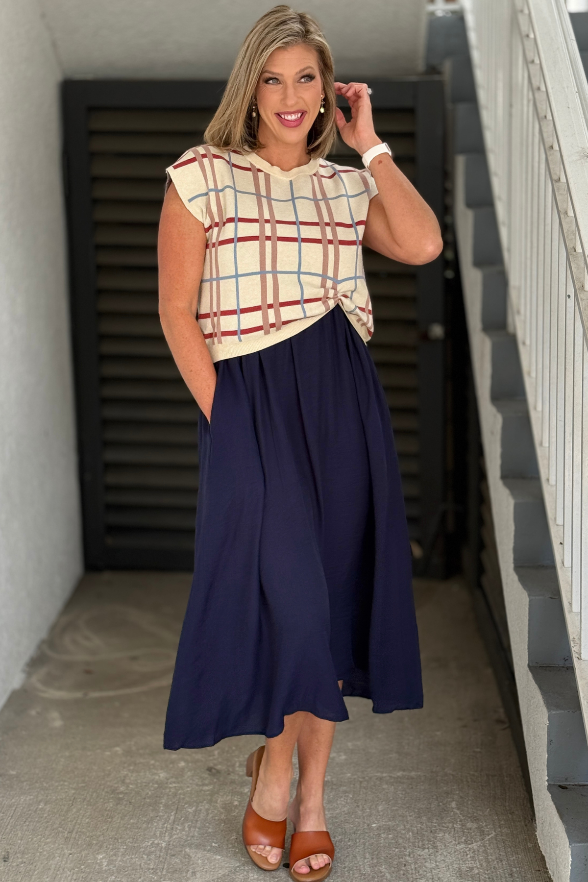 Navy sleeveless midi dress with removable plaid sweater top