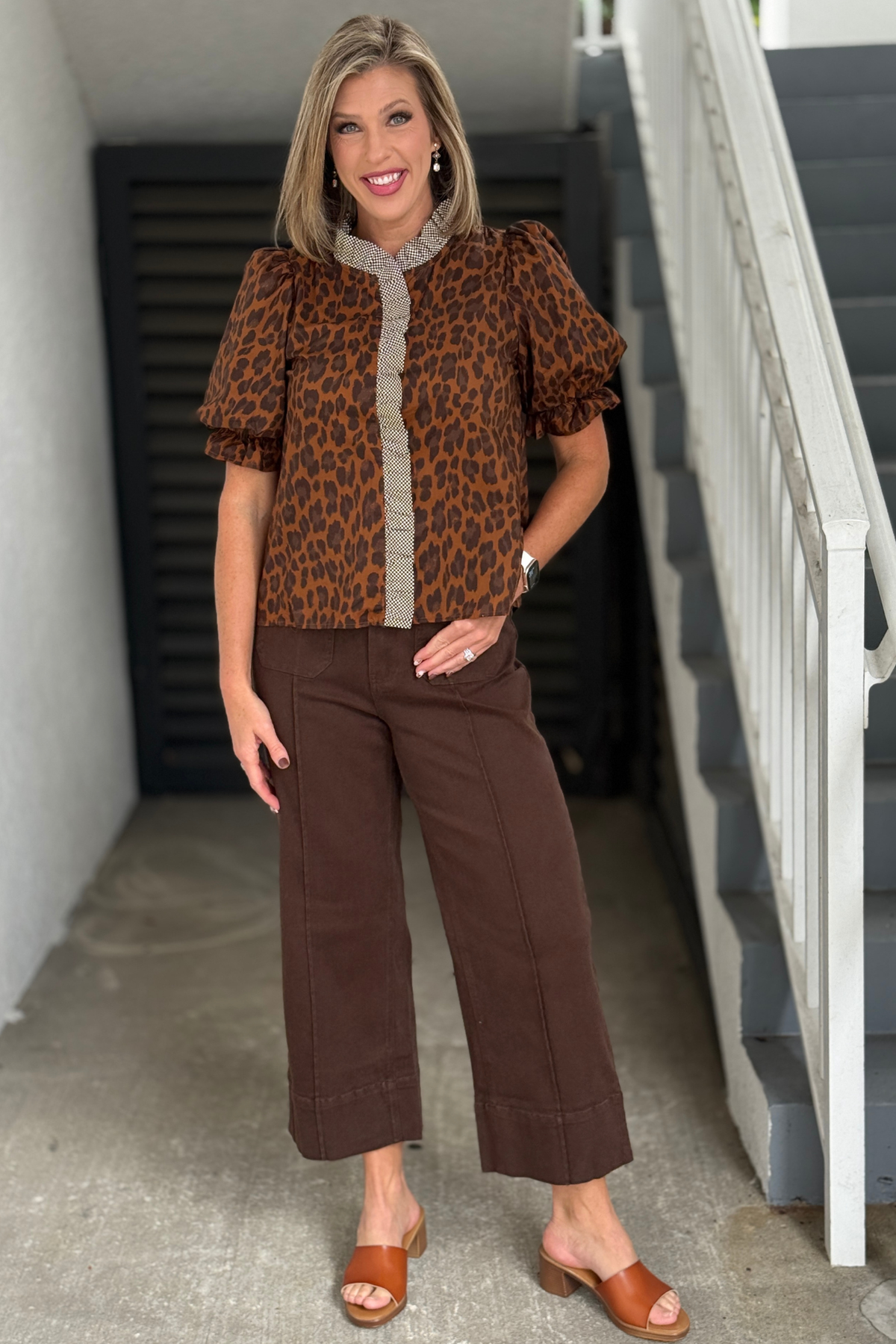 Women’s brown leopard blouse with contrast trim and button front