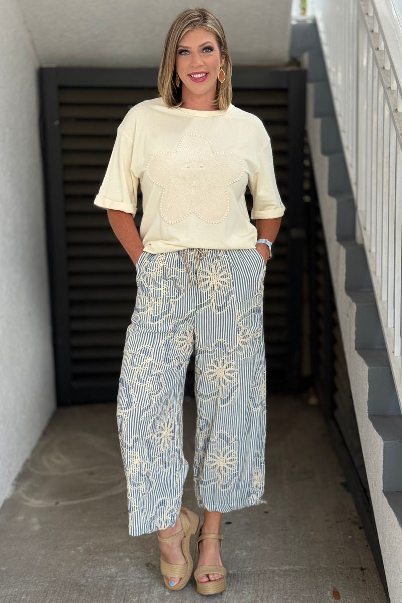 Relaxed fit striped boutique pants with cream floral embroidery detail