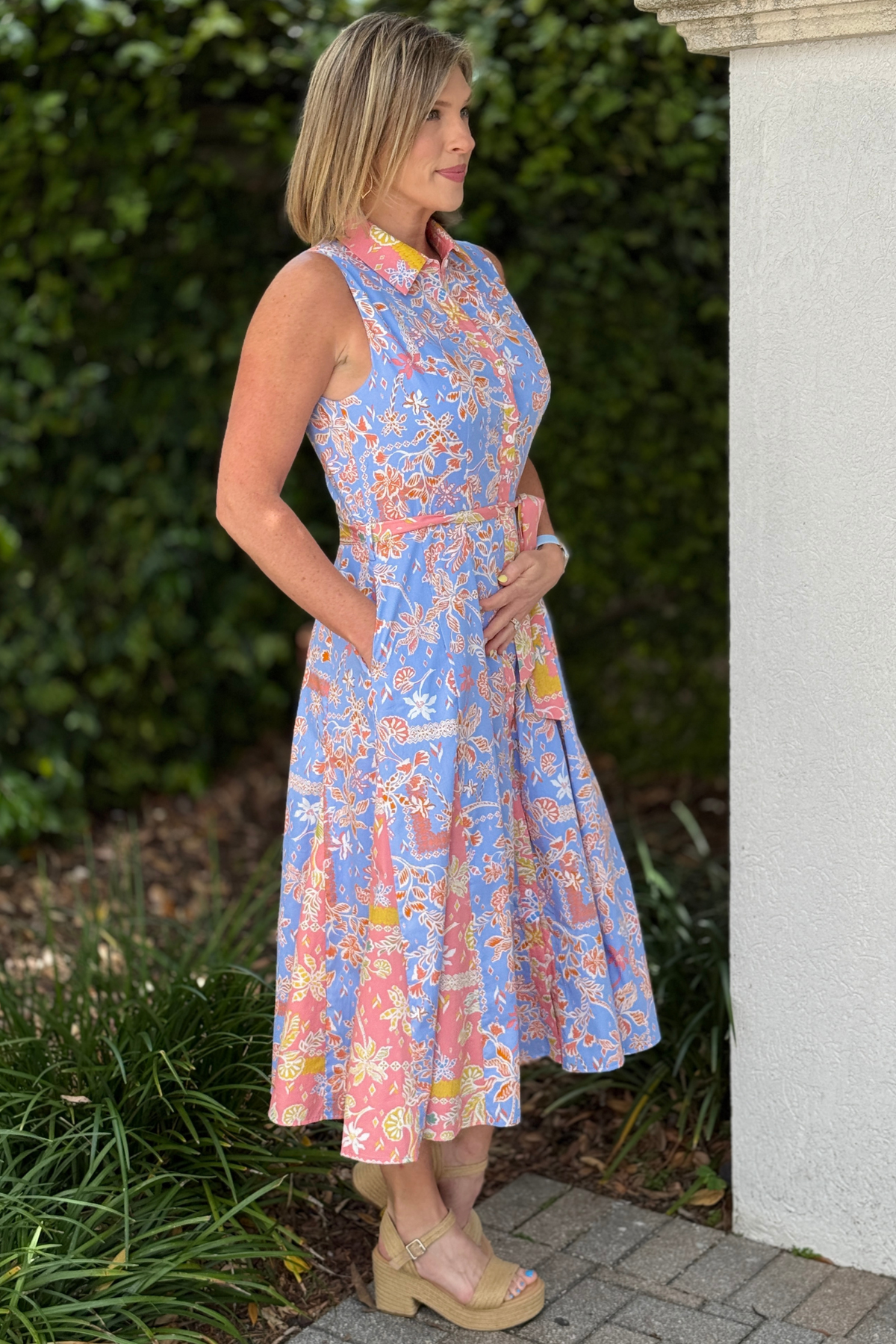 flowy A-line floral dress styled with wedges