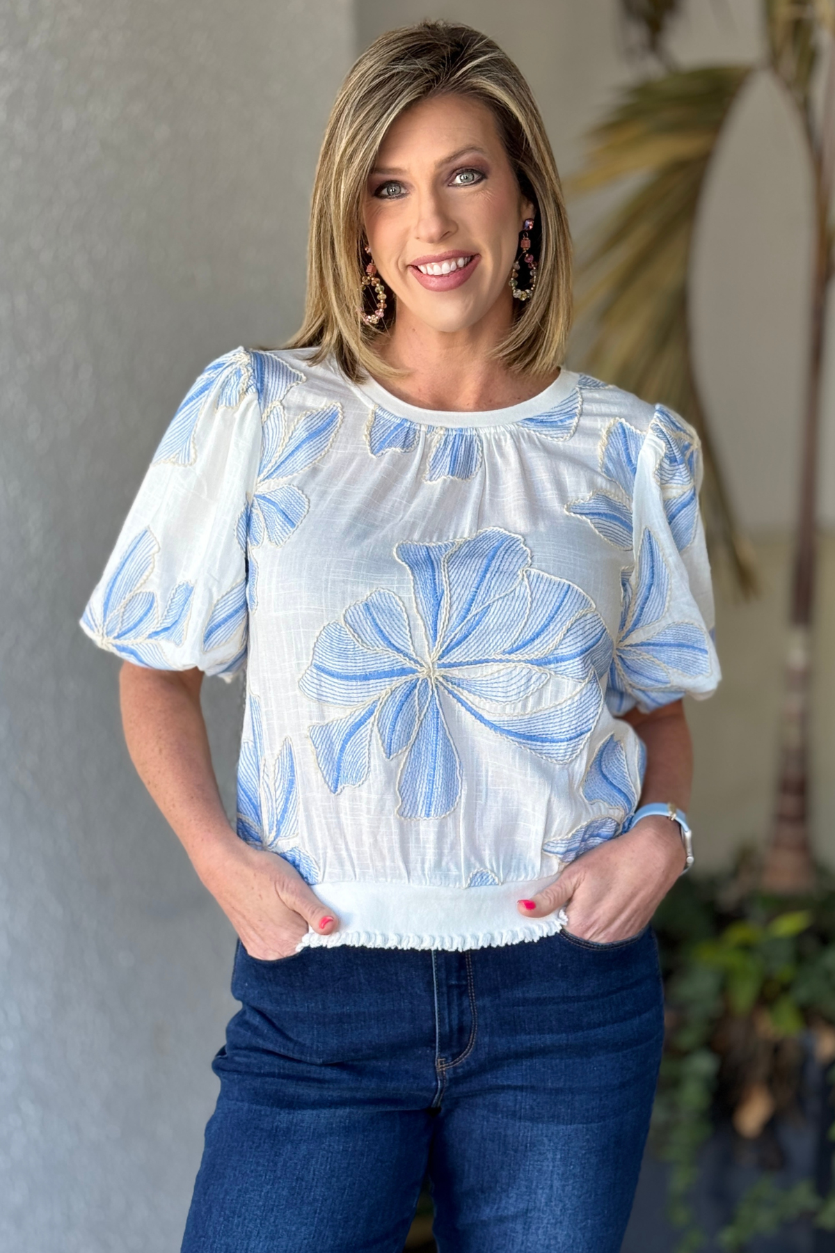Boutique floral bubble sleeve blouse styled with denim