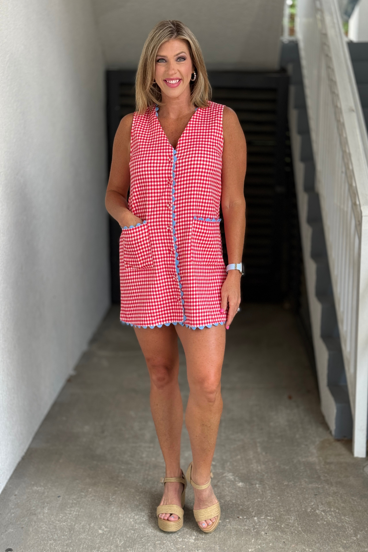 Women’s sleeveless summer dress styled with wedges