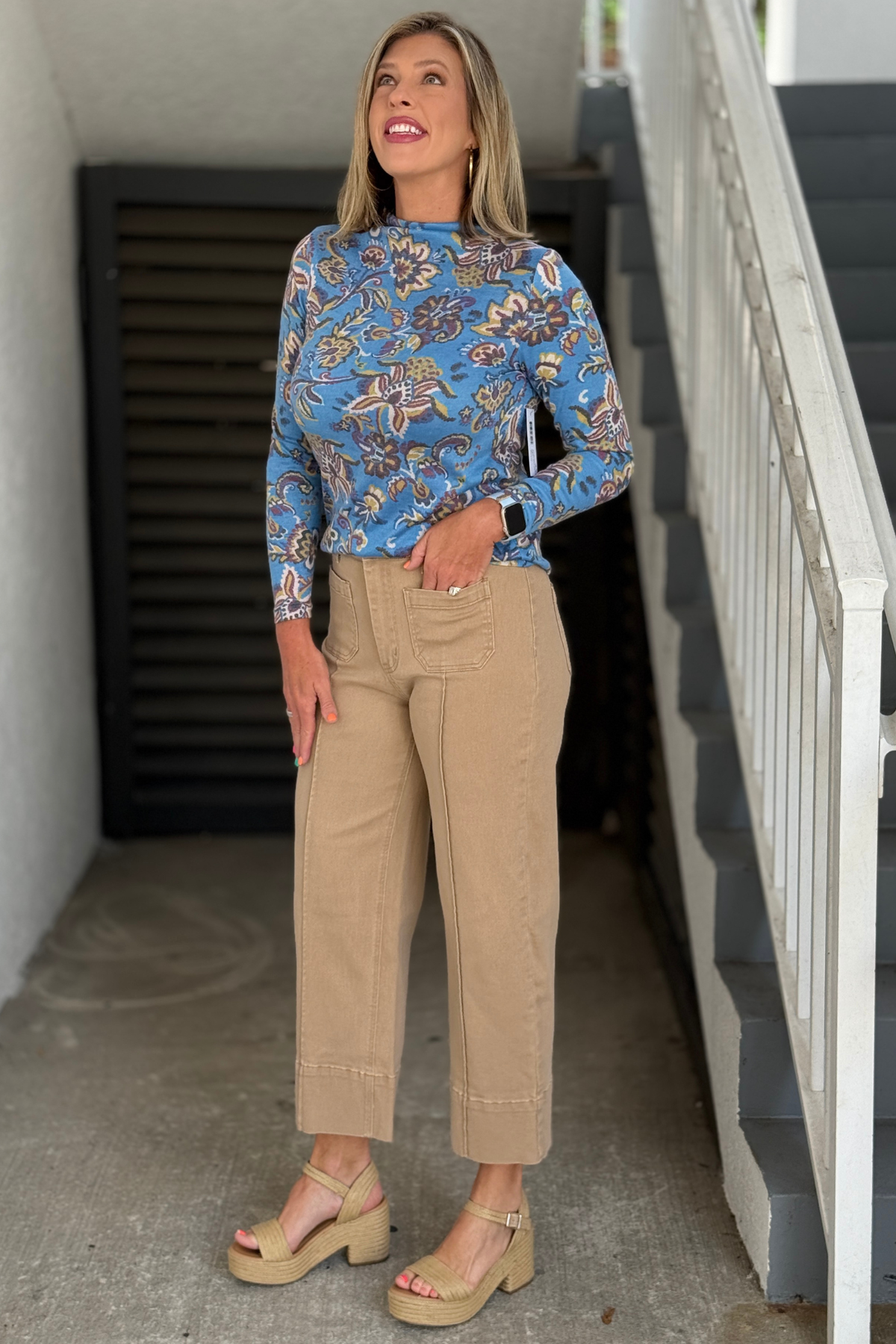 Back view of camel wide leg pants with patch pockets