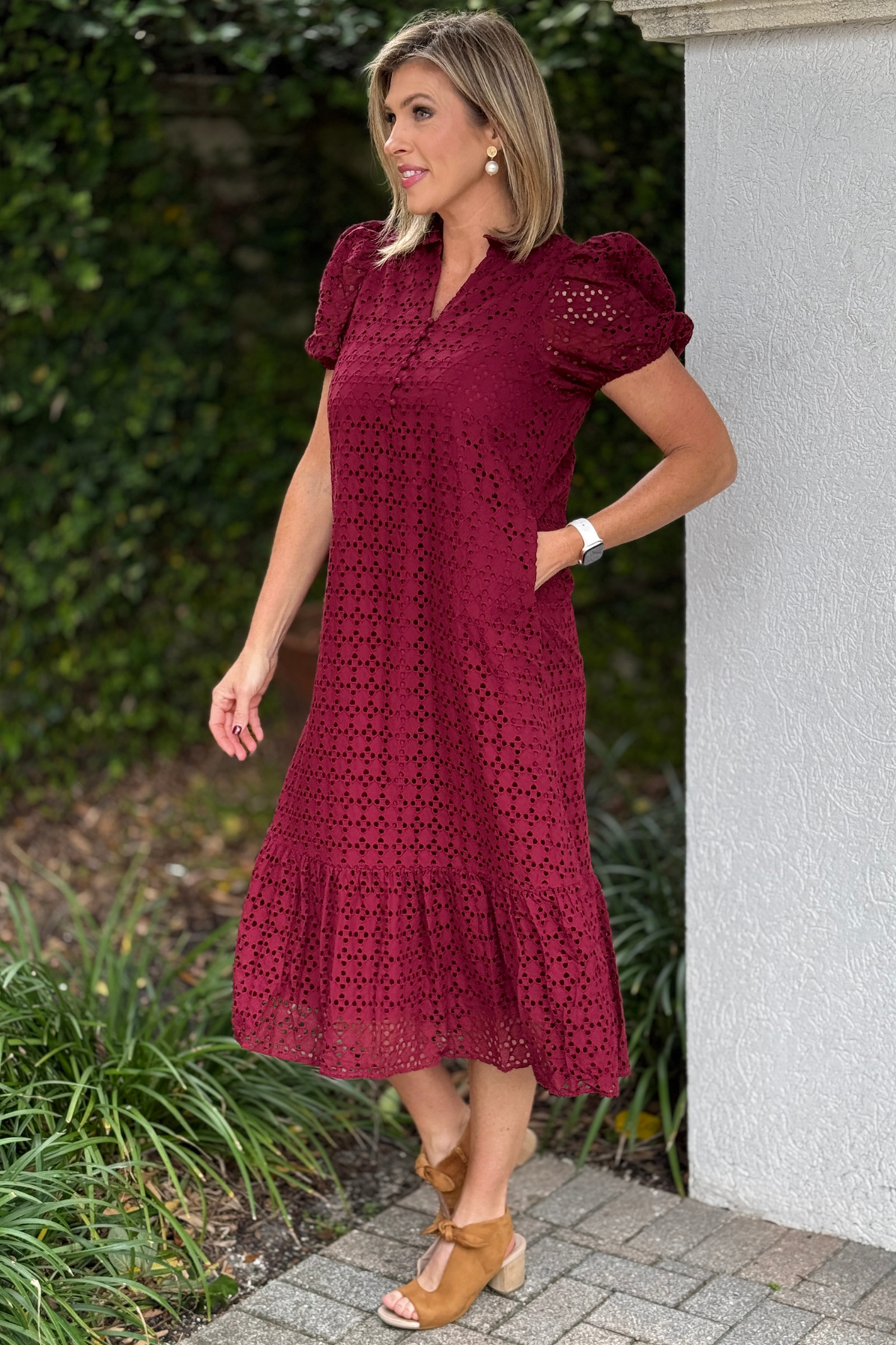 Christmas cranberry midi dress back view with eyelet fabric and ruffle hem