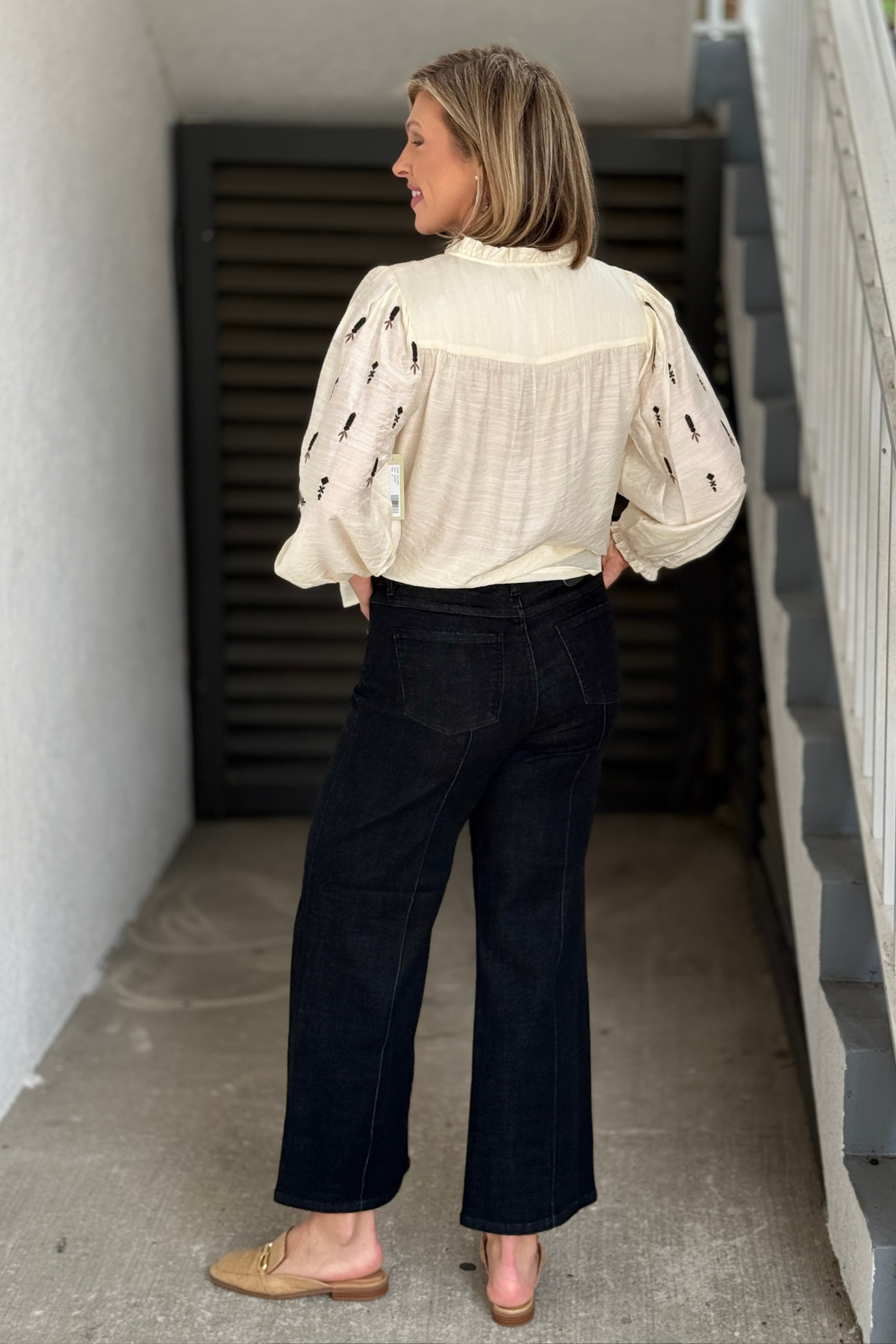 Back view of FDJ Olivia black denim with patch pockets