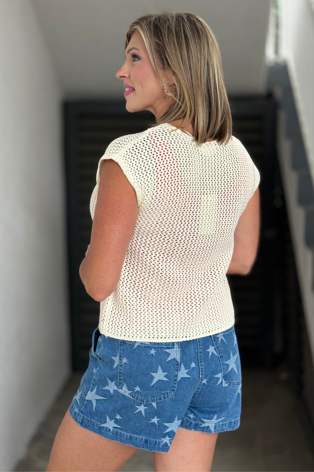 Boutique patriotic sweater top styled with denim shorts