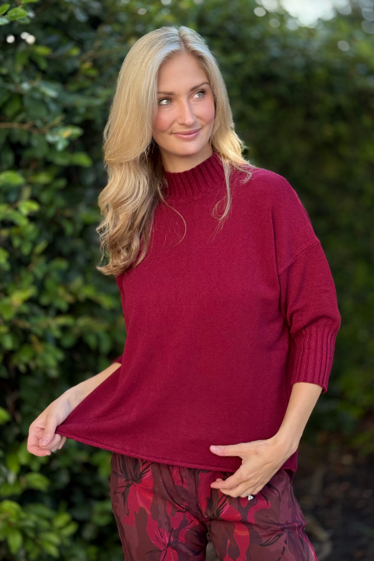 Front view of model wearing Flora Ashley Mock Neck Knit Sweater in Burgundy