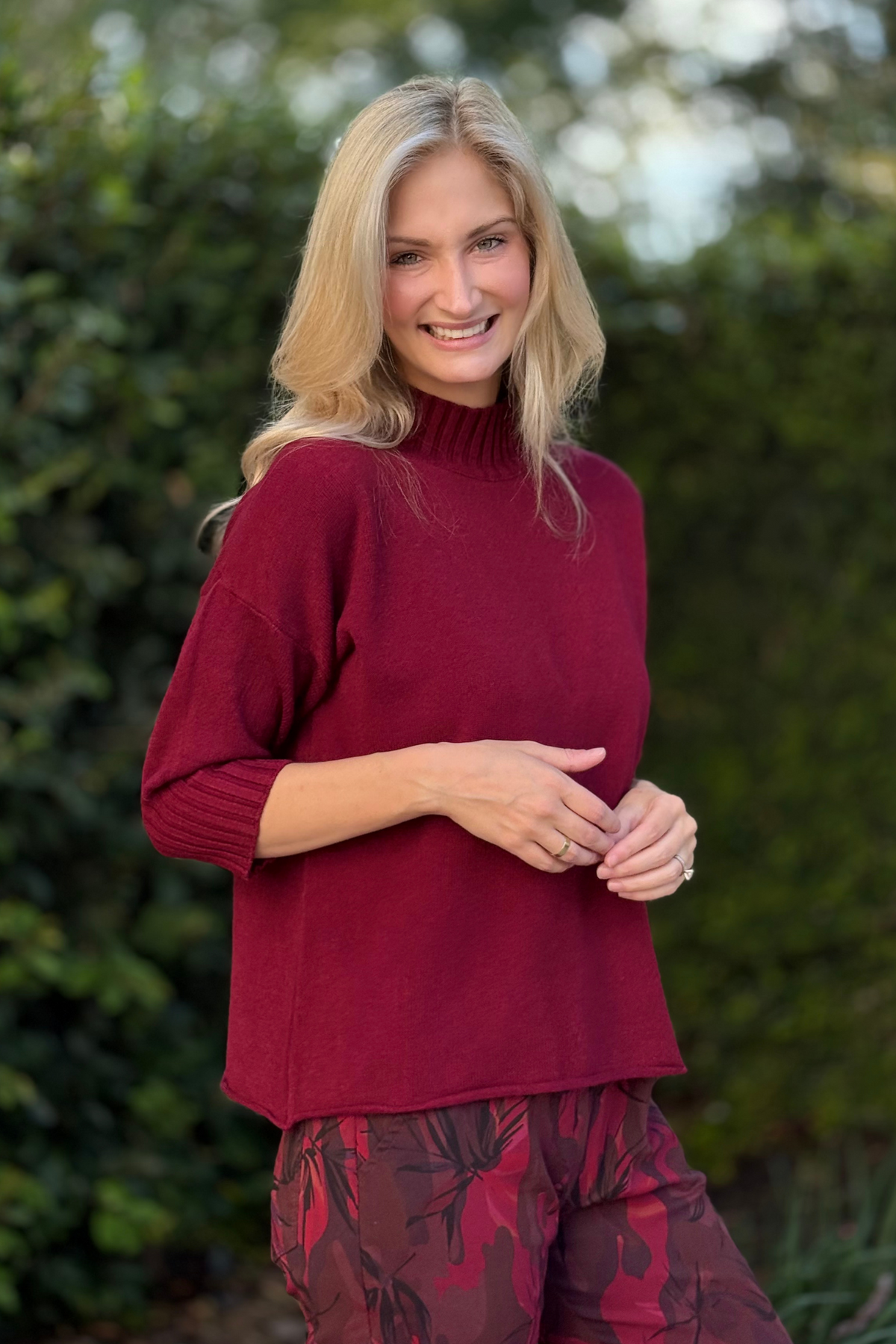 Close-up of soft knit texture and ribbed collar on Flora Ashley sweater