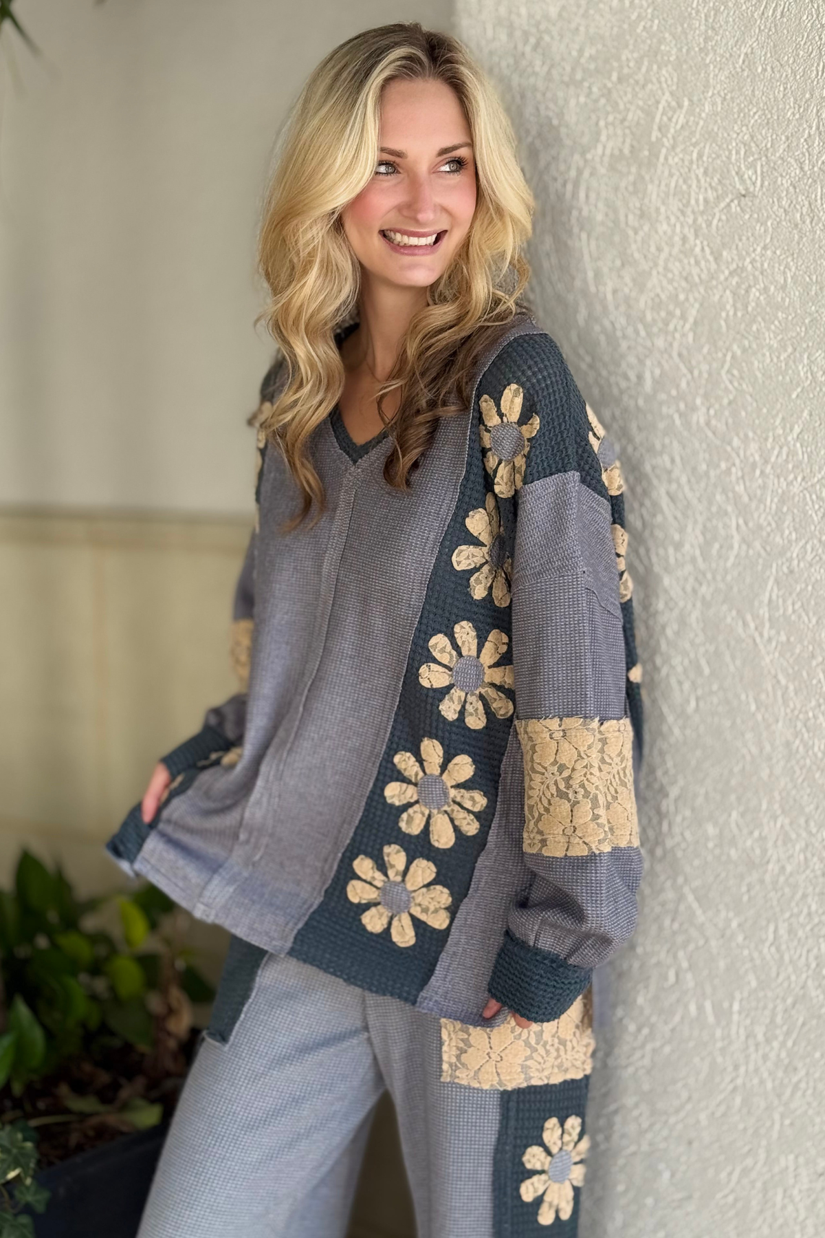 Boho slate blue waffle knit top with lace flower appliqué