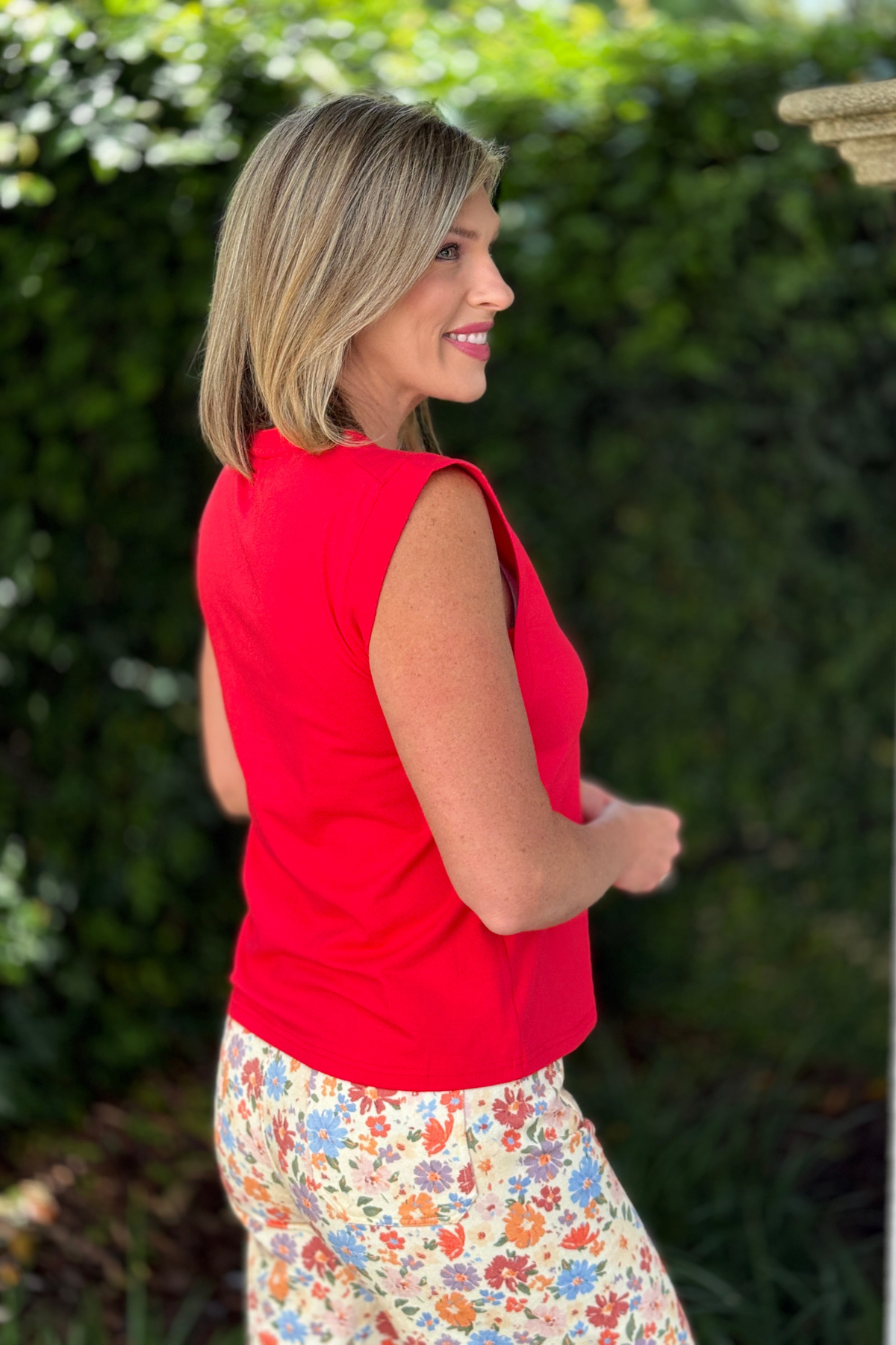 Trendy floral graphic top styled with printed shorts