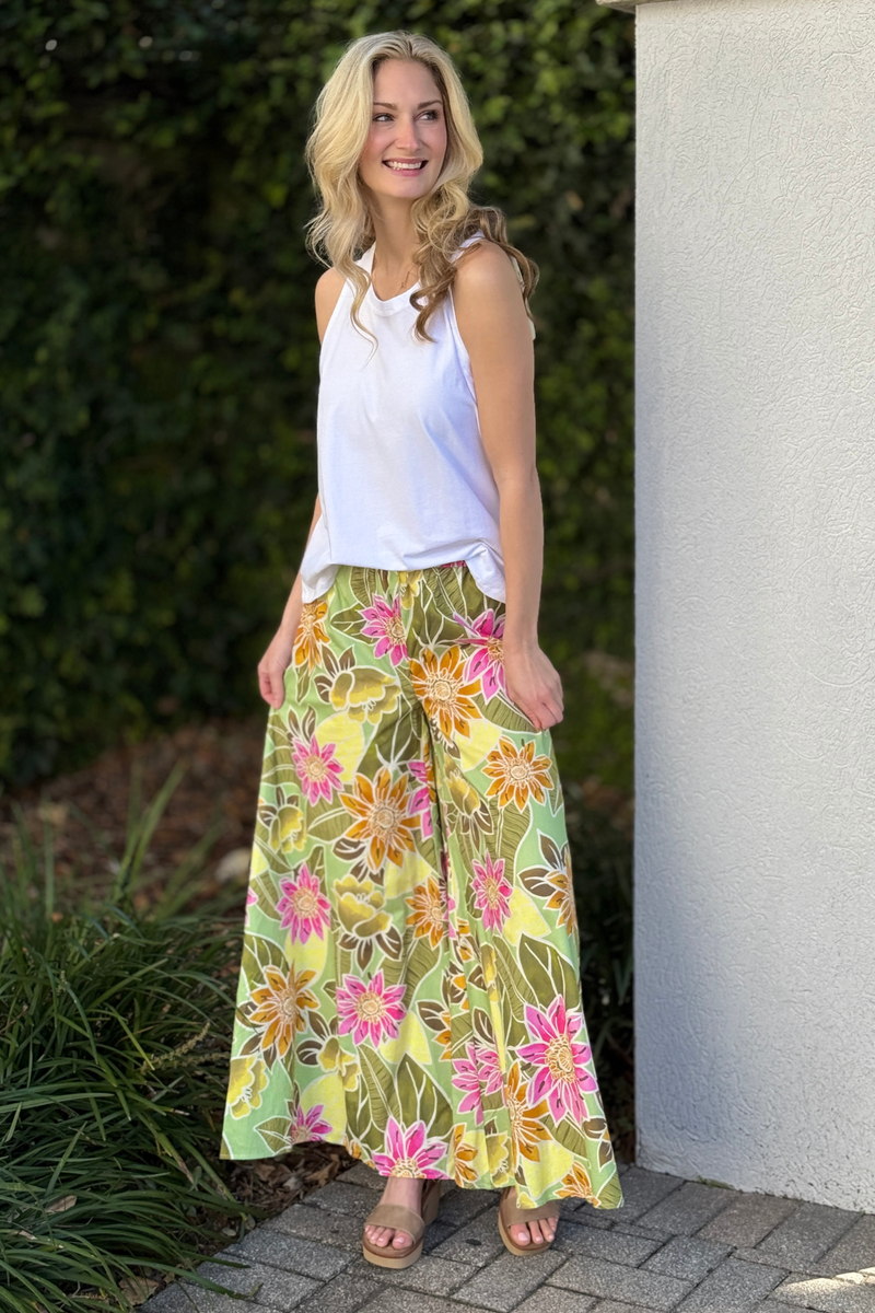 Lightweight floral spring pants styled with white tank