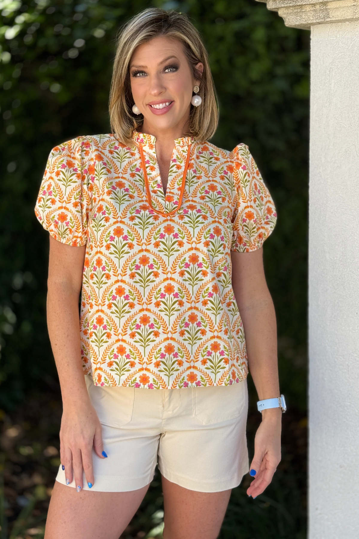 orange and pink floral boutique top