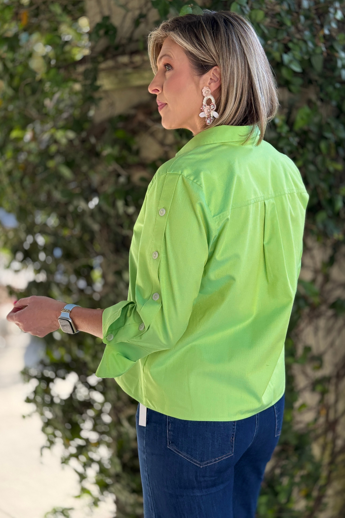 Polished women’s work blouse in fresh green