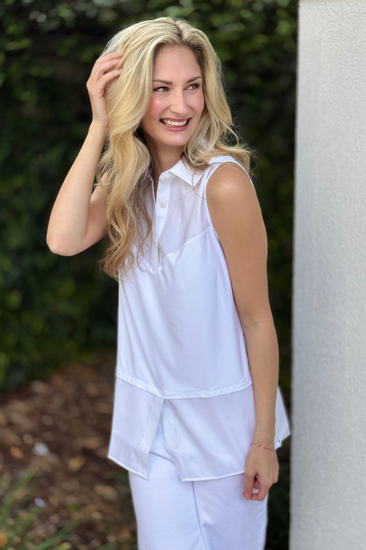 Layering tunic styled under blue cardigan