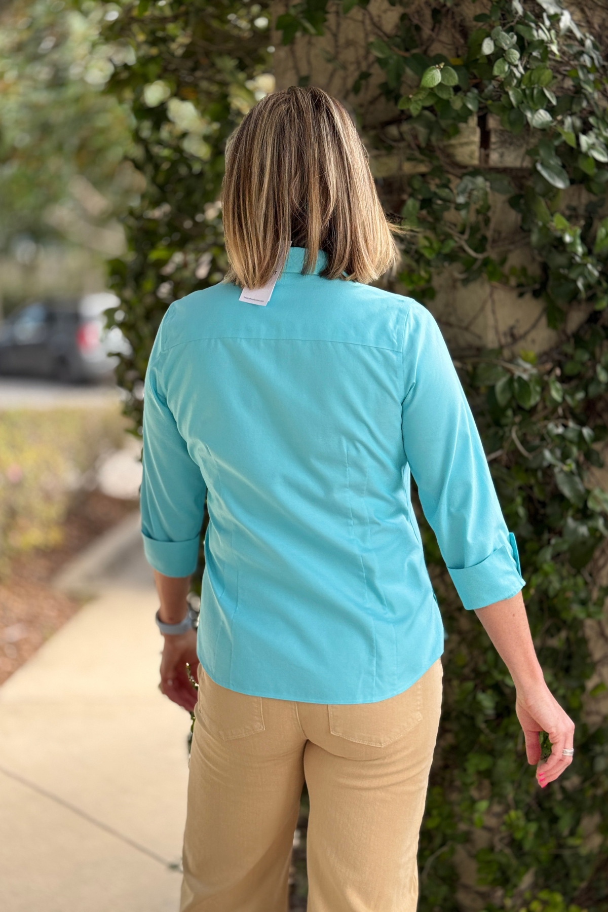 Capri blue blouse styled with safari jeans