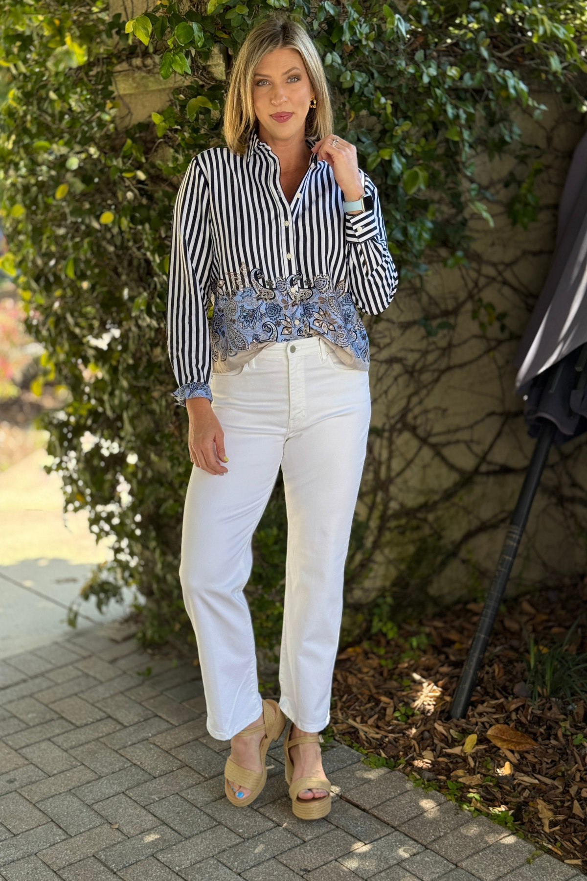 striped blouse with blue paisley hem detail