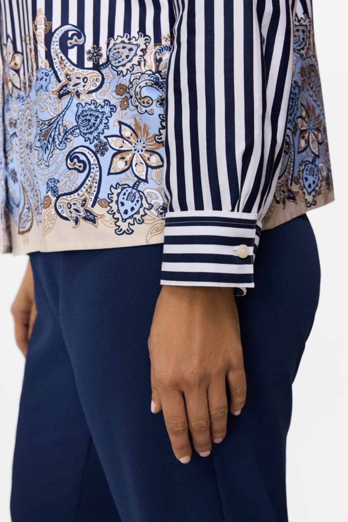 close up cuff detail striped shirt paisley print