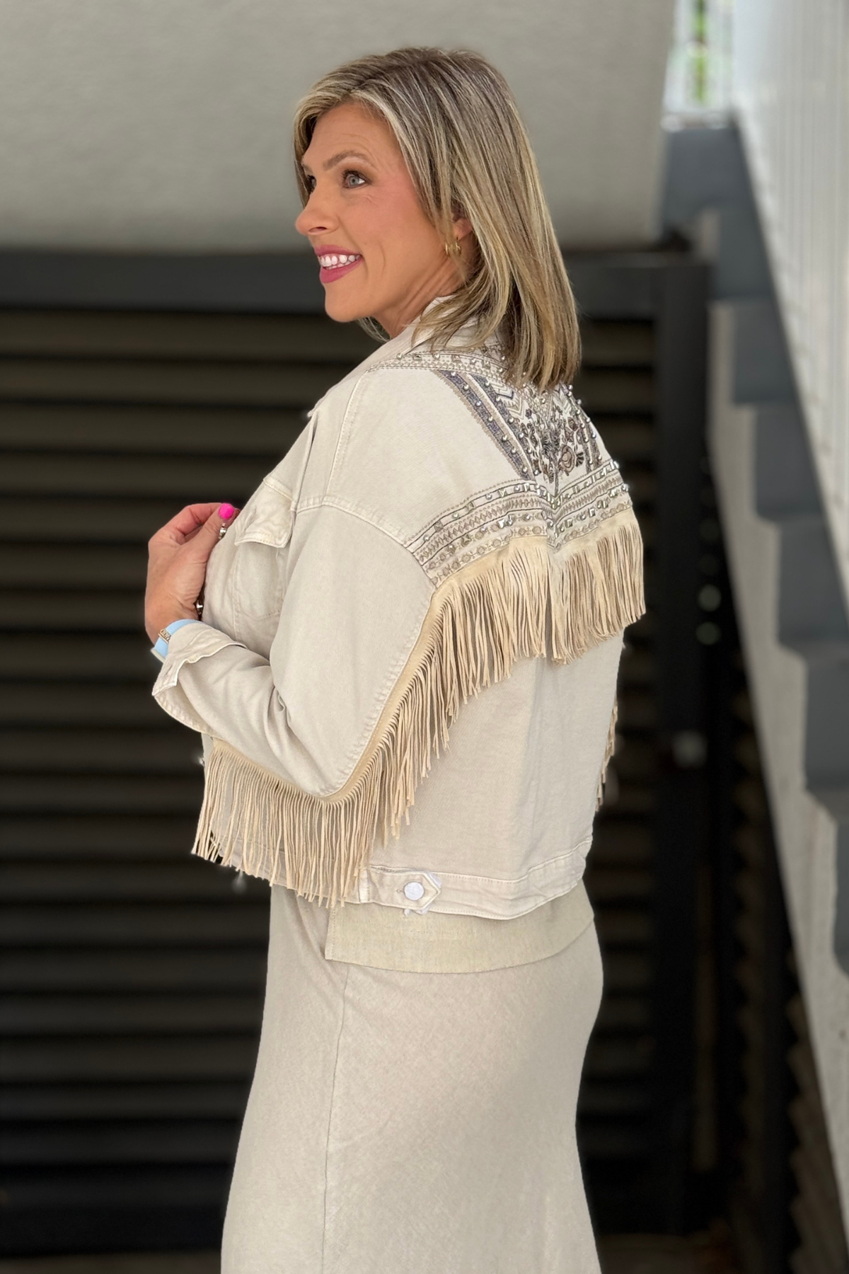 designer inspired western glam jacket styled with dress