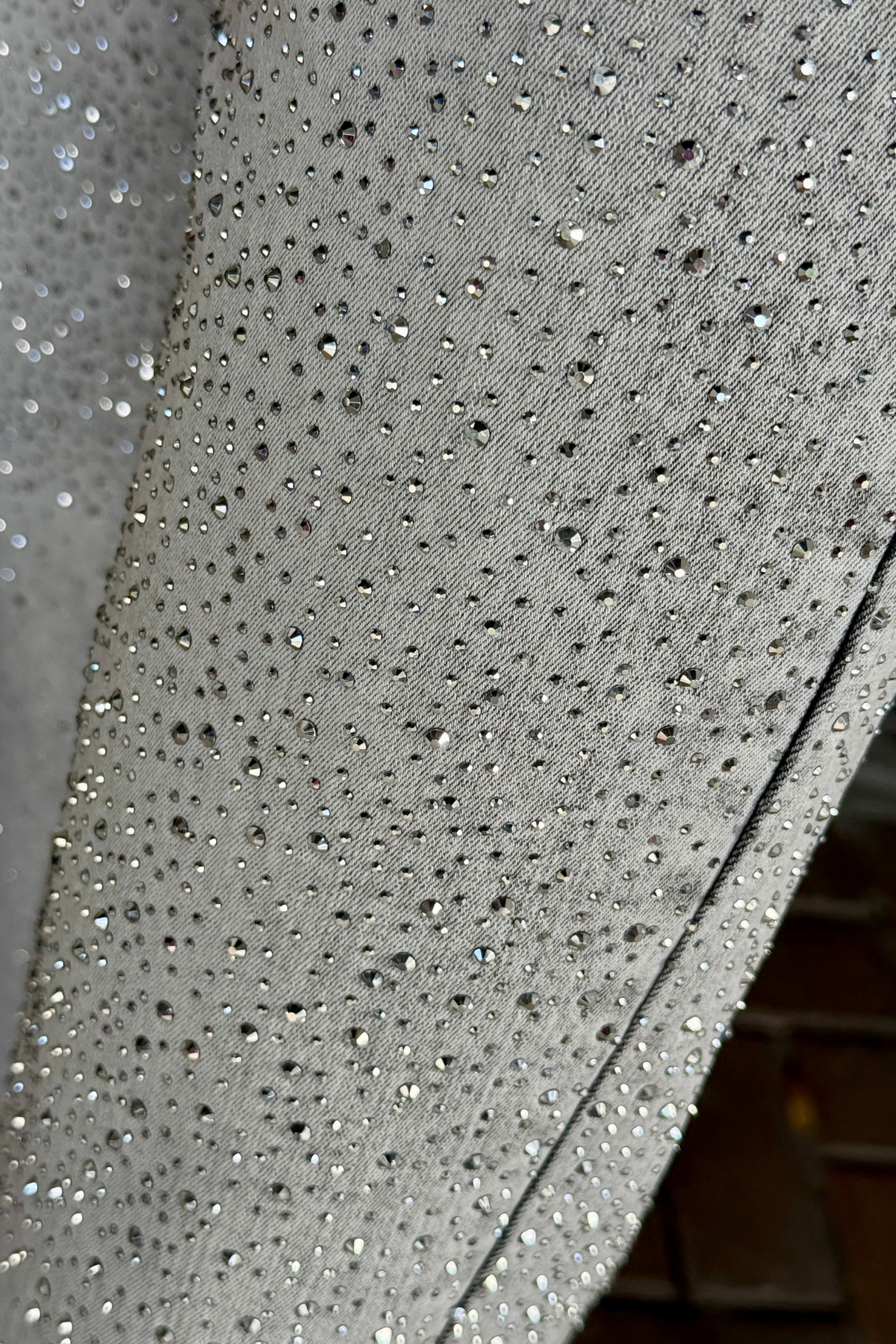 Full length Frank Lyman sparkle jeans styled with wedges