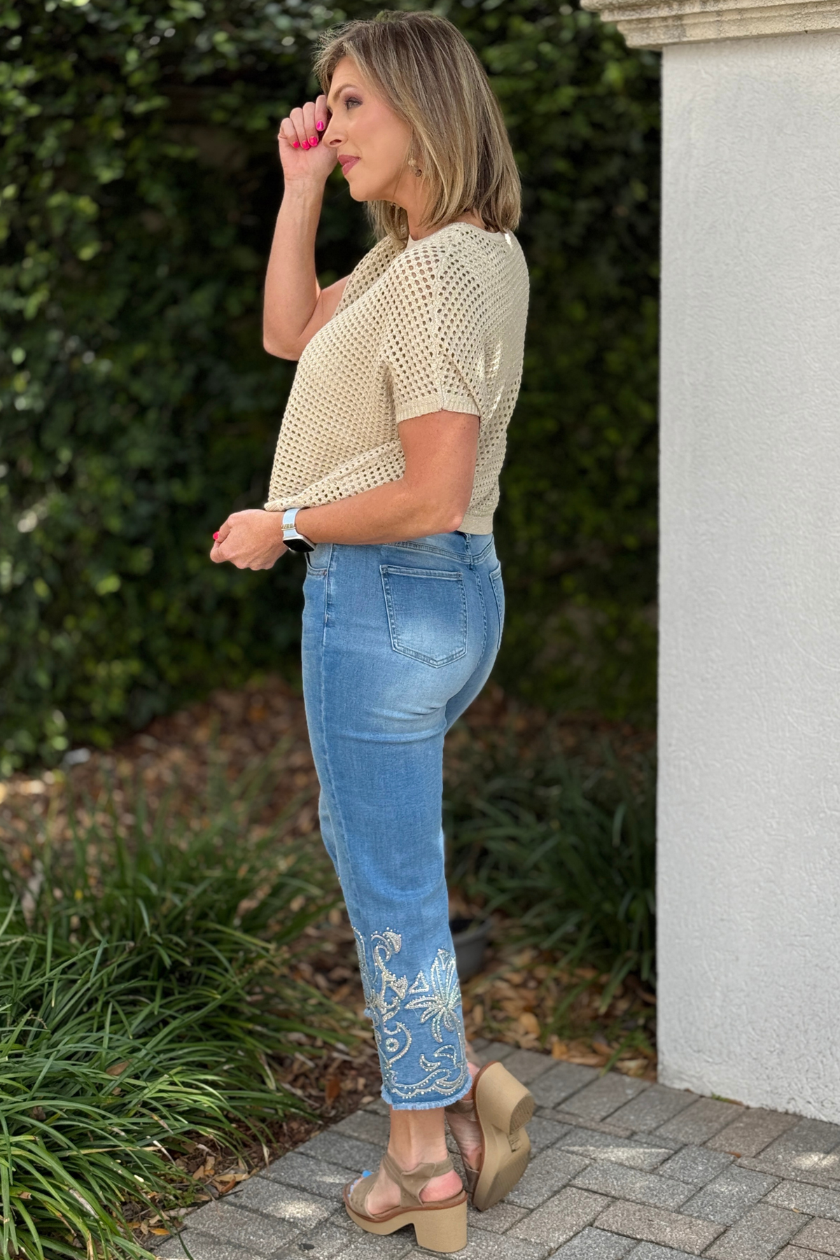 Spring 2026 boutique denim with tropical hem detail