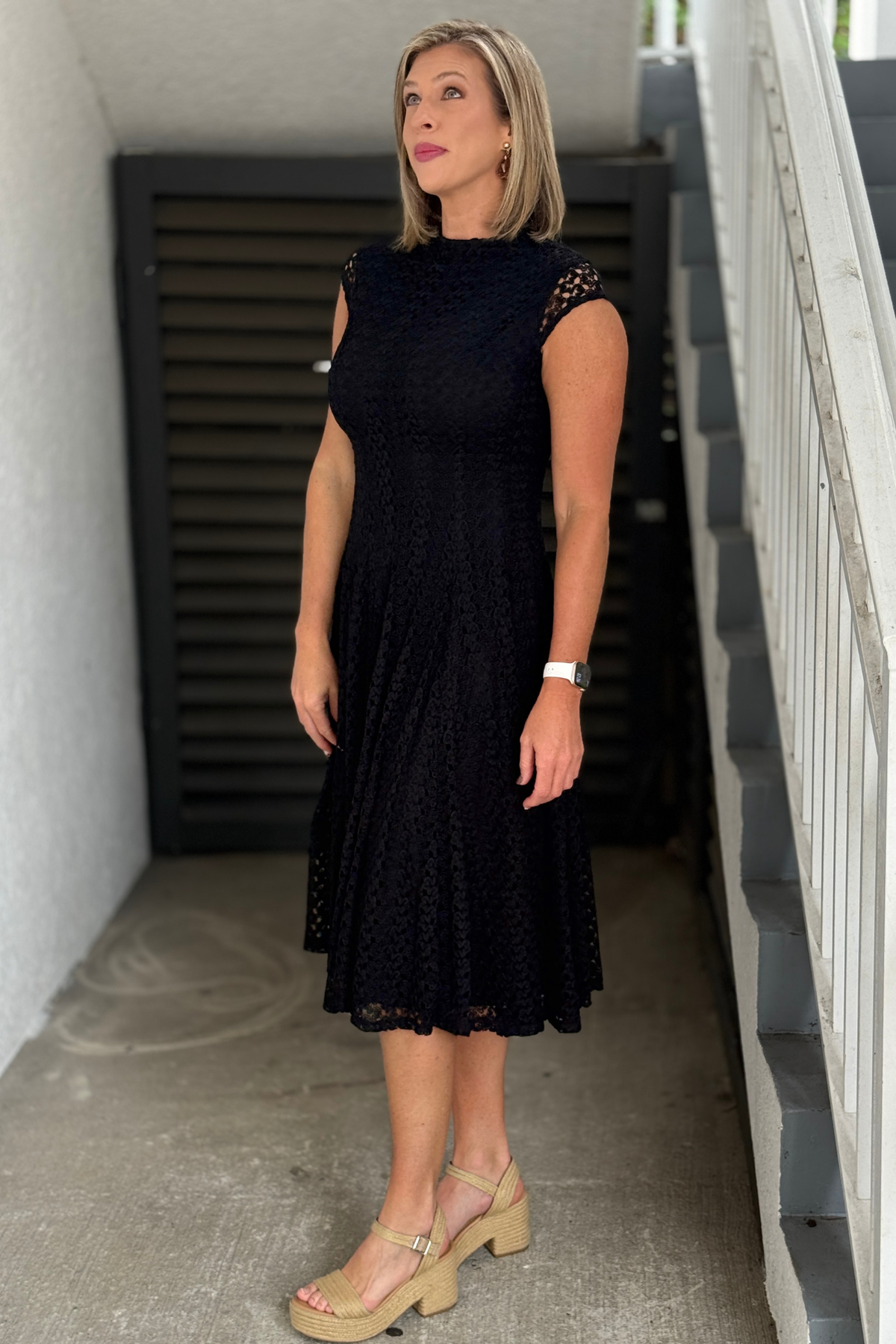Frank Lyman black special occasion midi dress with intricate lace detail