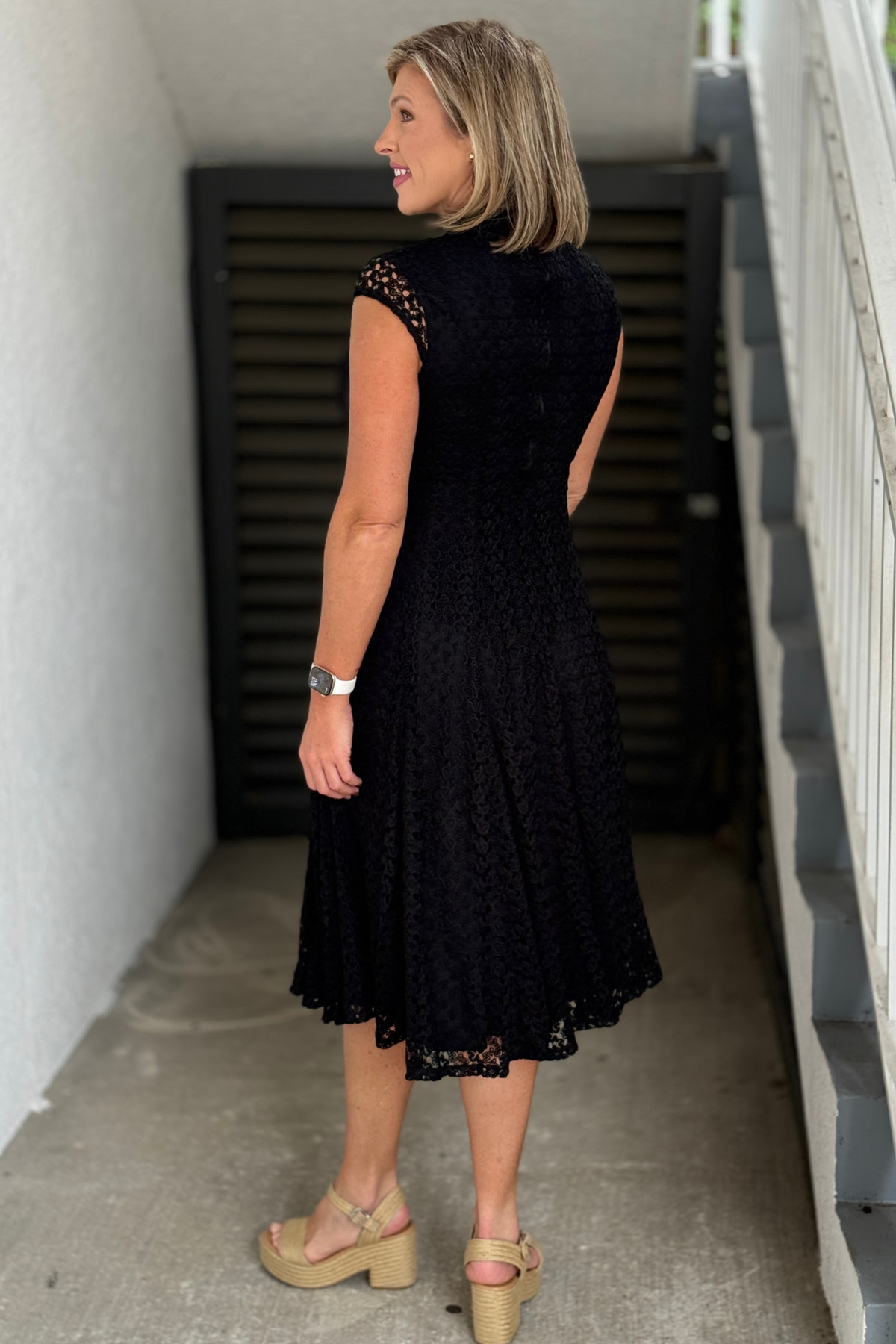 Elegant women’s black lace midi dress for weddings and special occasions
