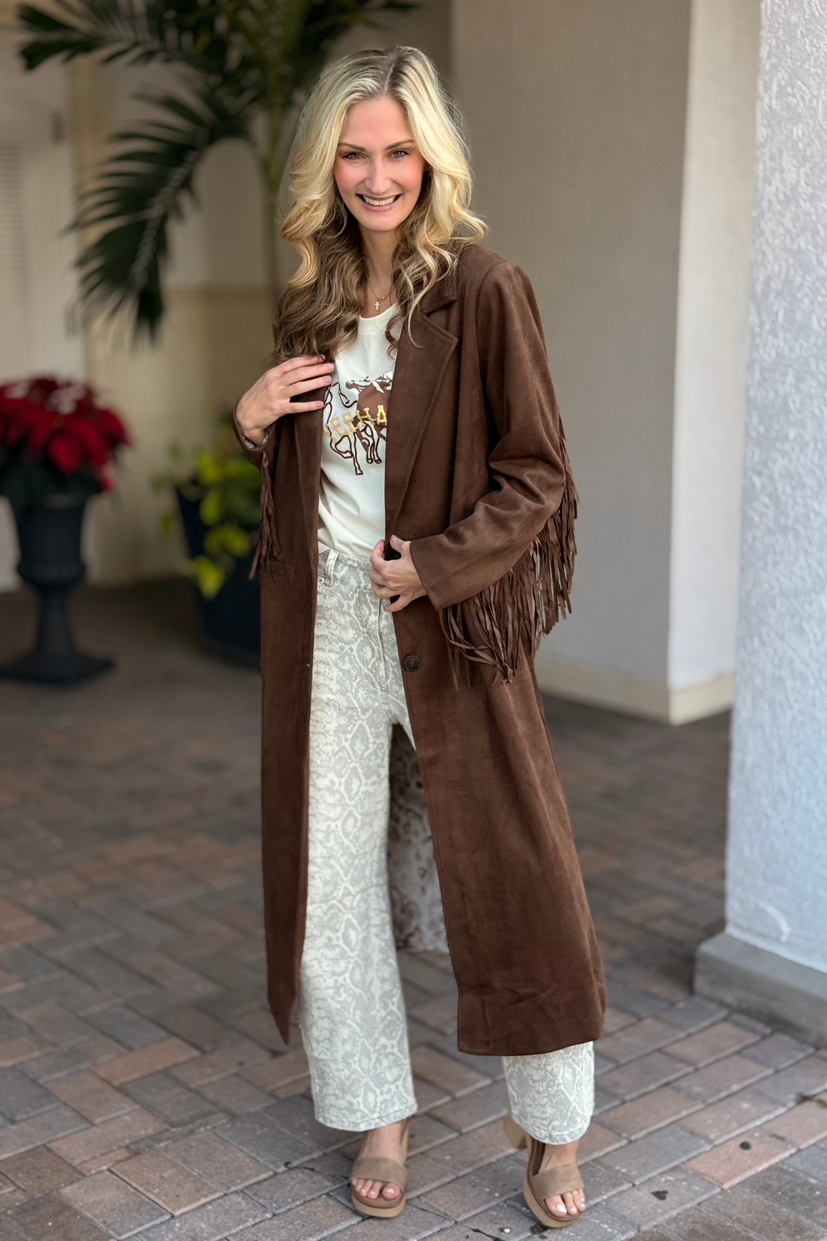 Brown faux suede fringe maxi coat with snakeskin lining