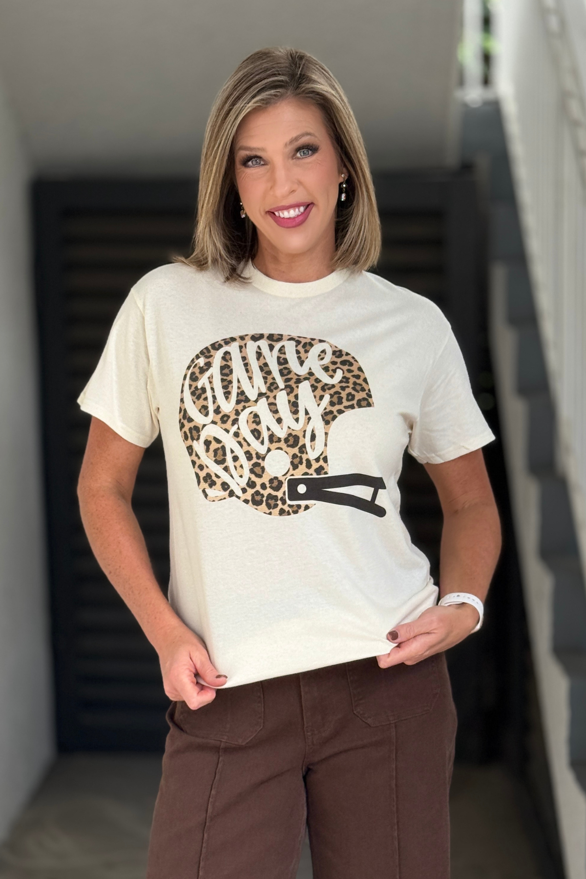 Women’s natural football graphic tee with leopard helmet