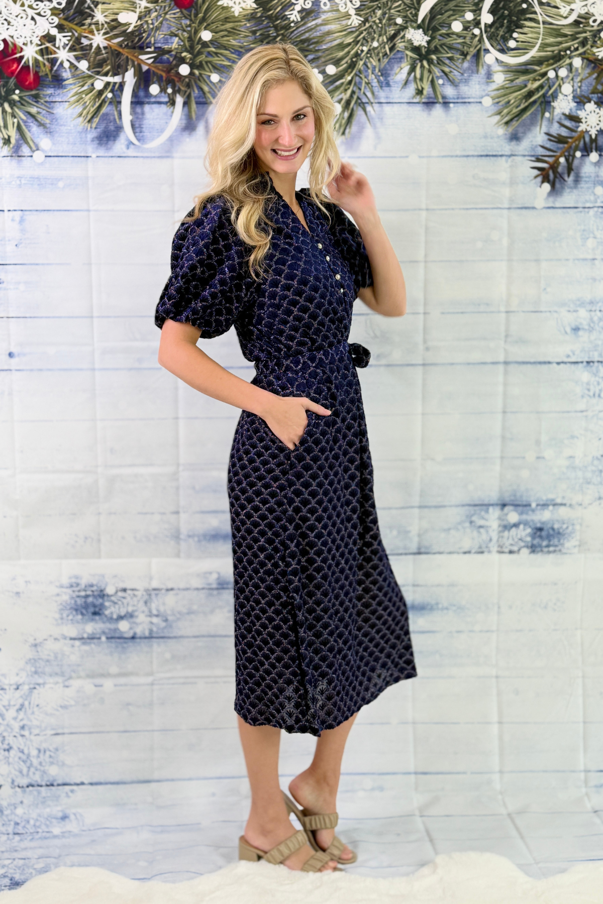 Navy holiday midi dress with pockets and pearl button detail