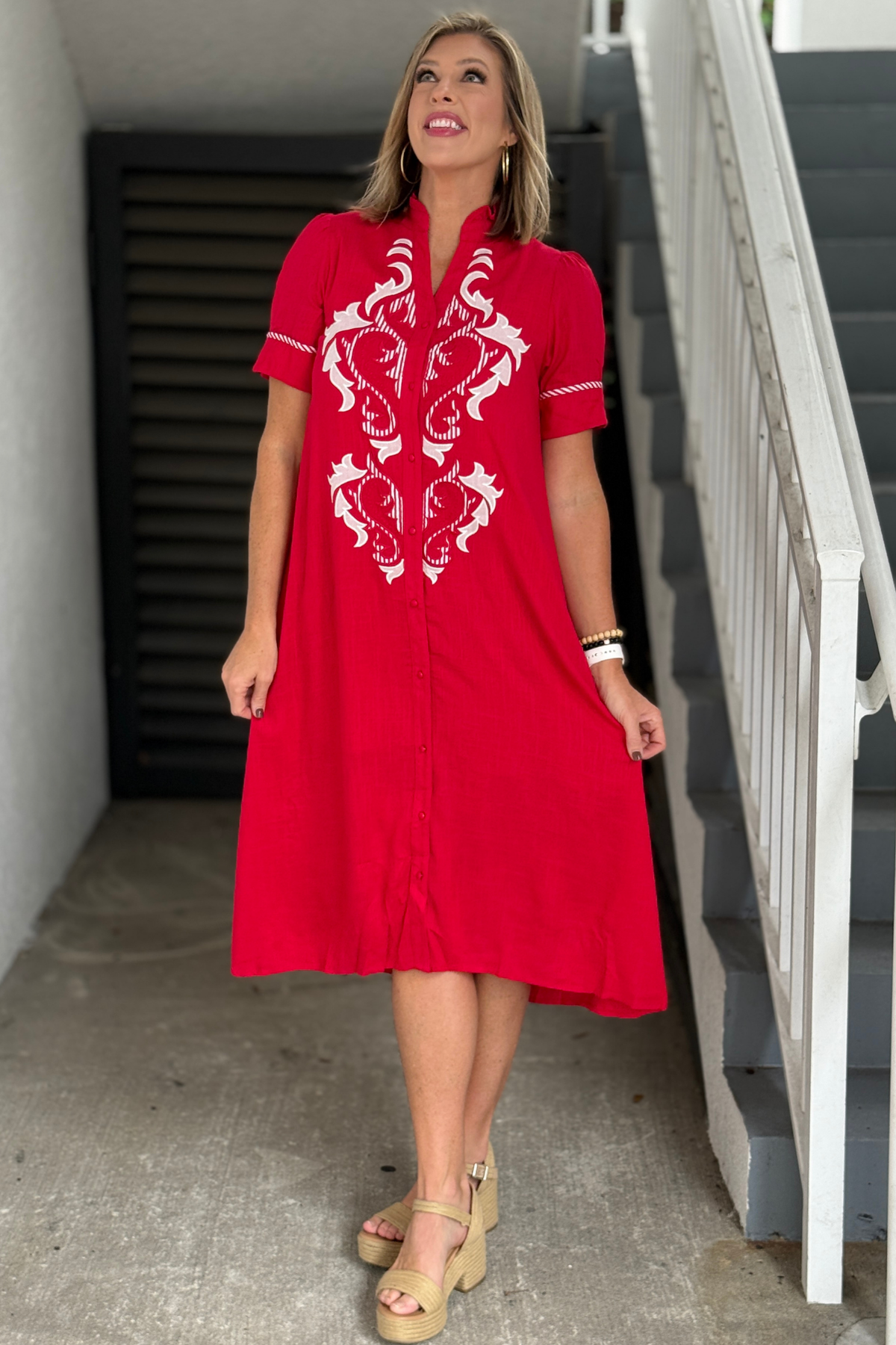 Red embroidered midi dress with contrast striped sleeve accents