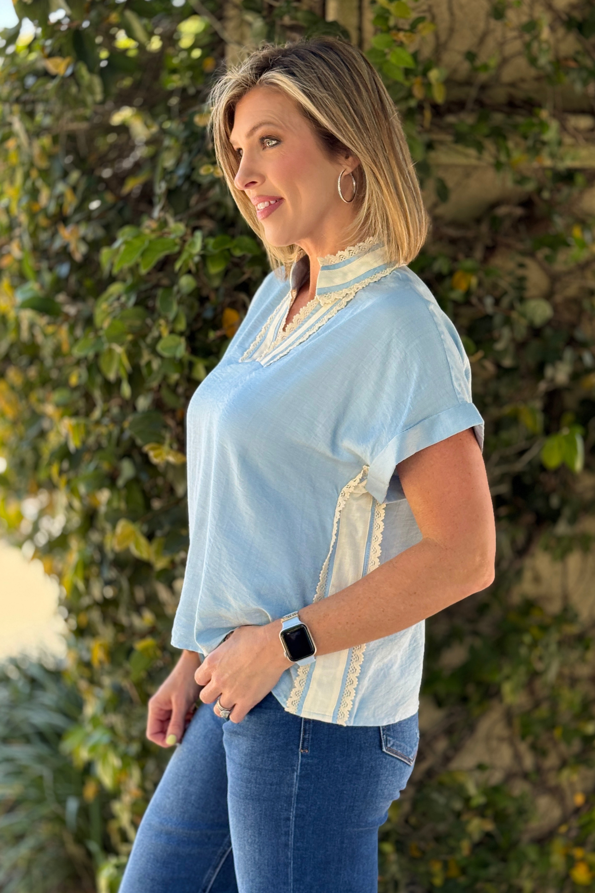 casual blue blouse with rolled cuff sleeves